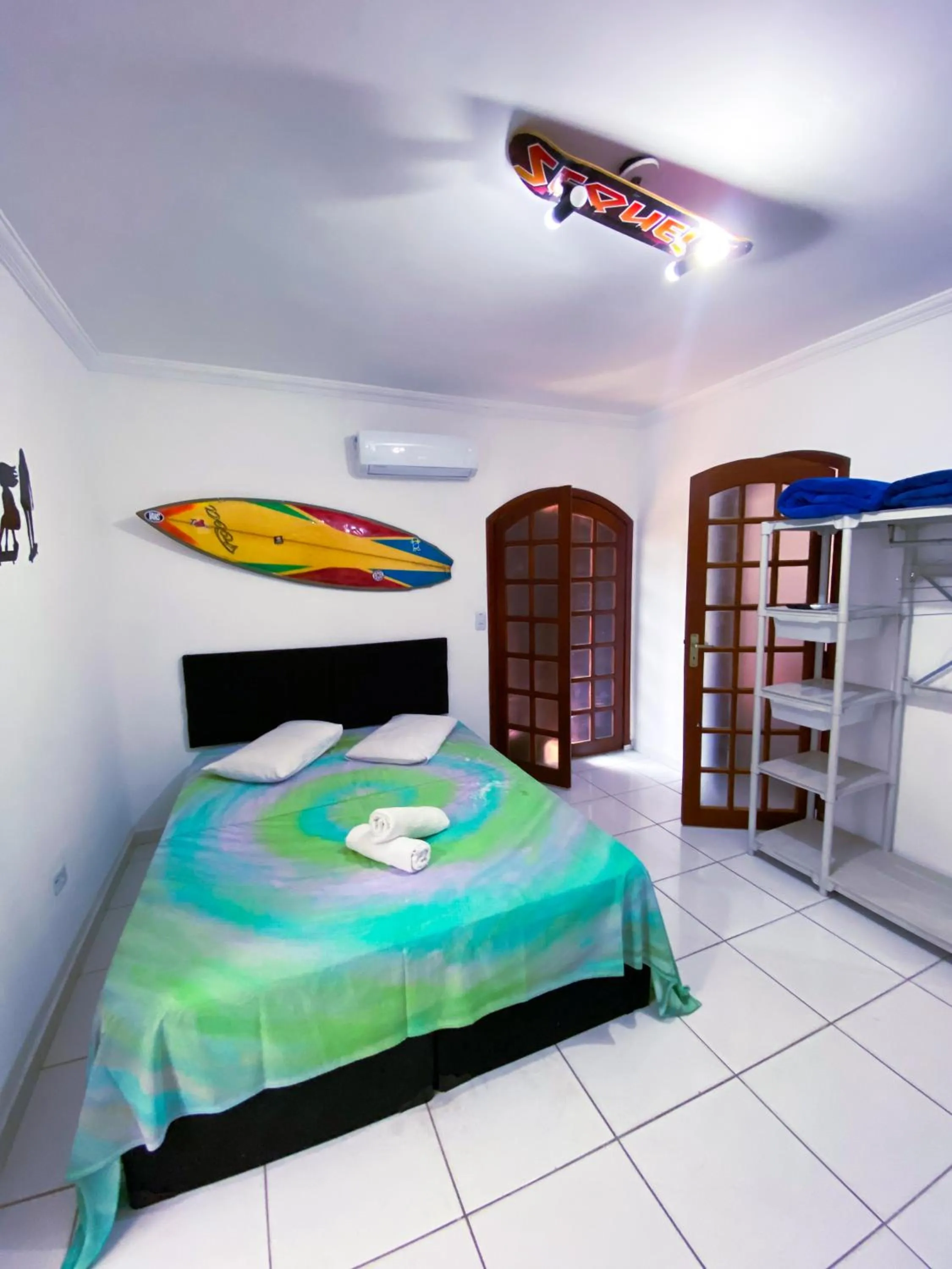 Bed in Pousada Praia do Tombo