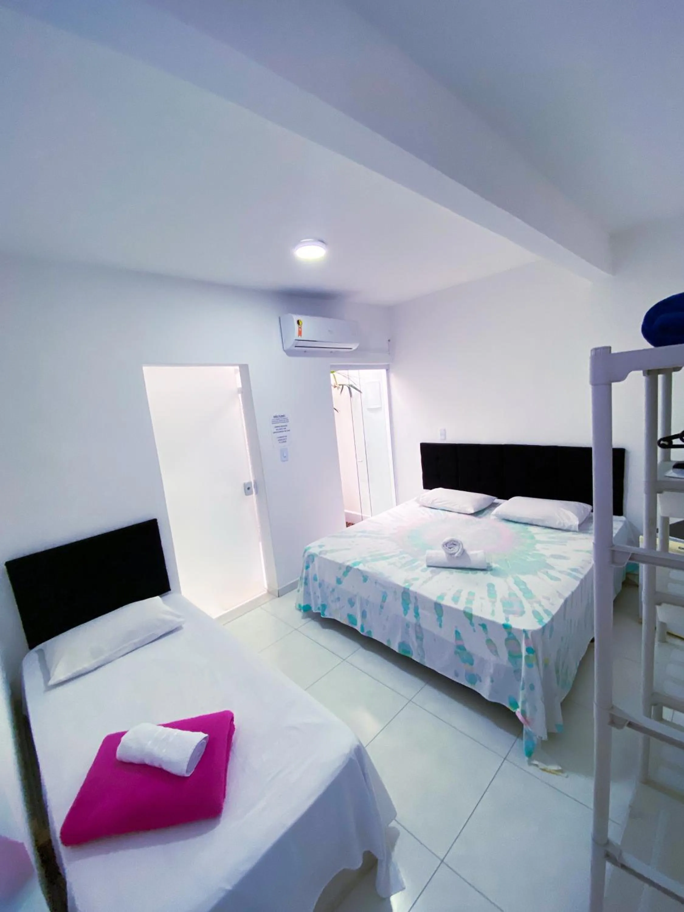 Bed in Pousada Praia do Tombo