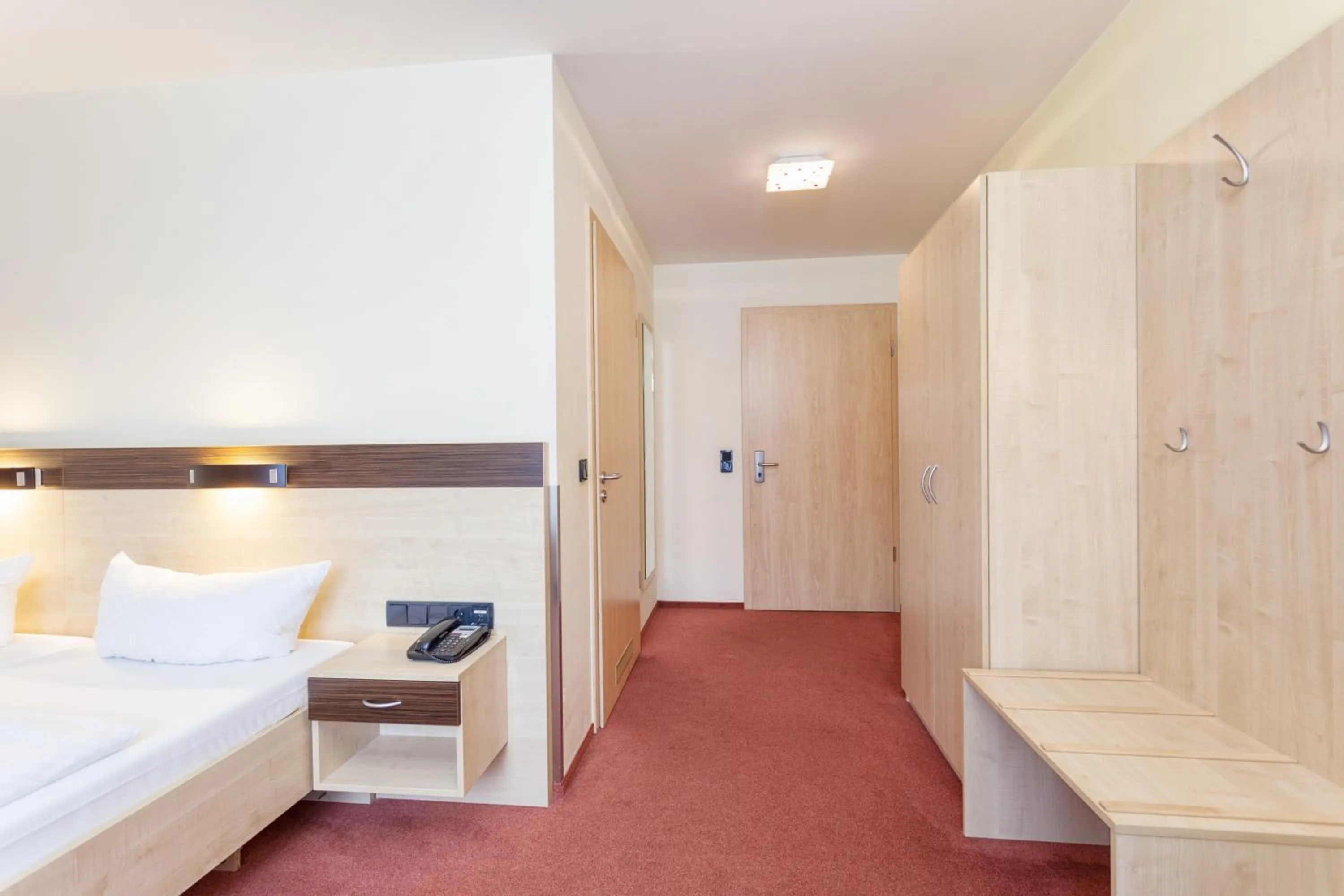 Bed in Hotel Mit-Mensch