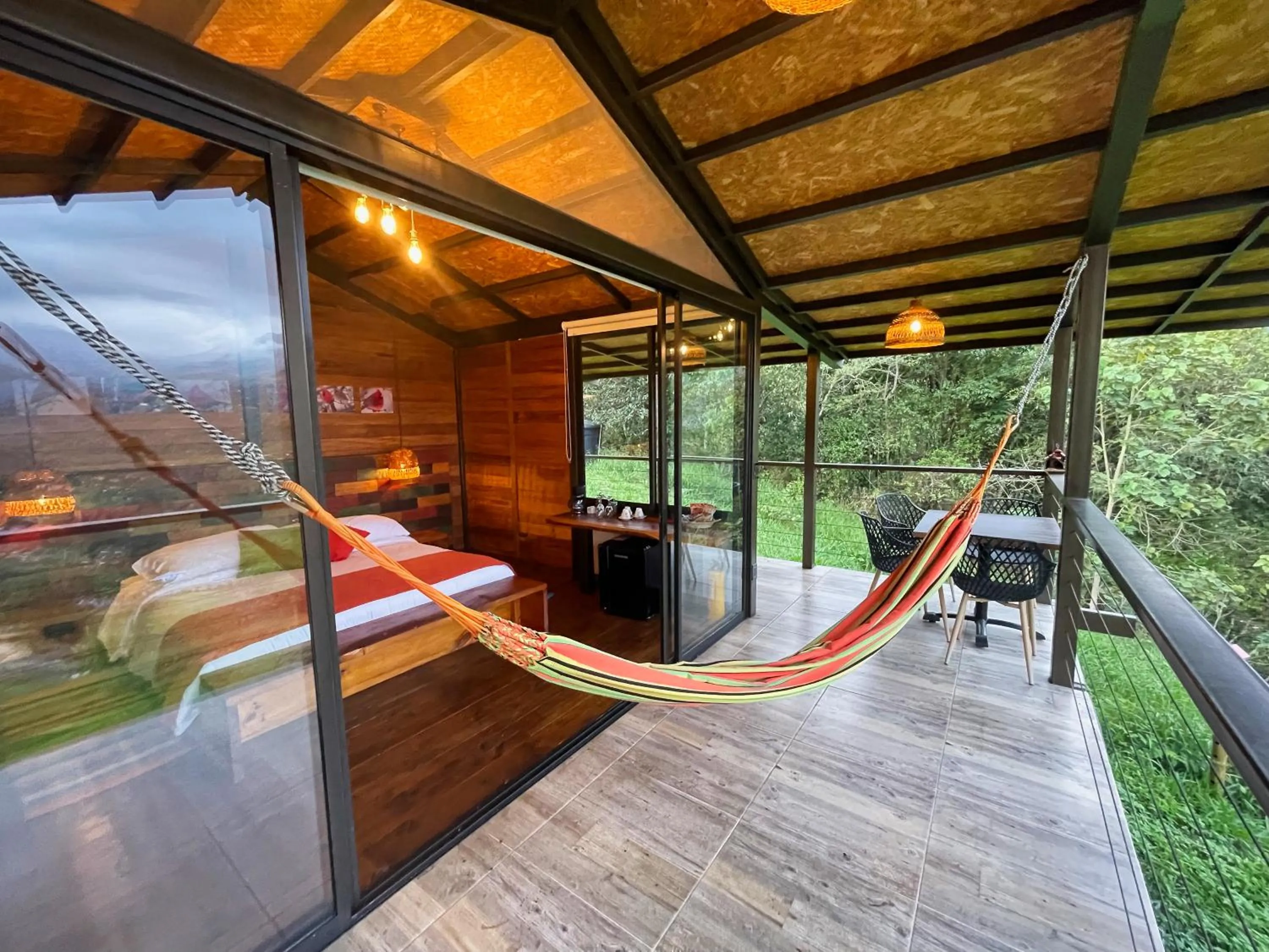 Balcony/Terrace, Bed in Natubri Ecohotel