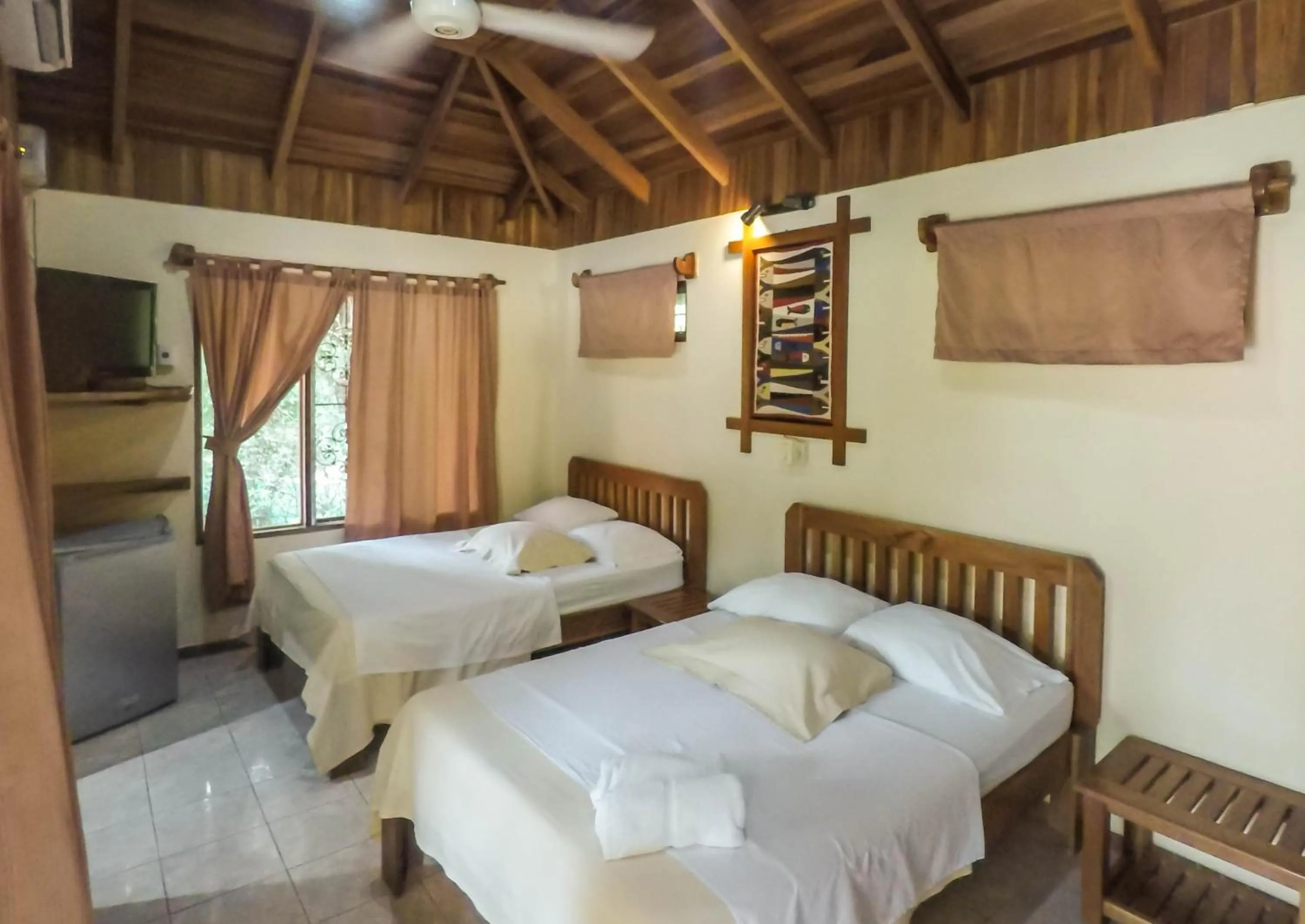 Bed in Hotel Ritmo Tropical - Pool and Breakfast