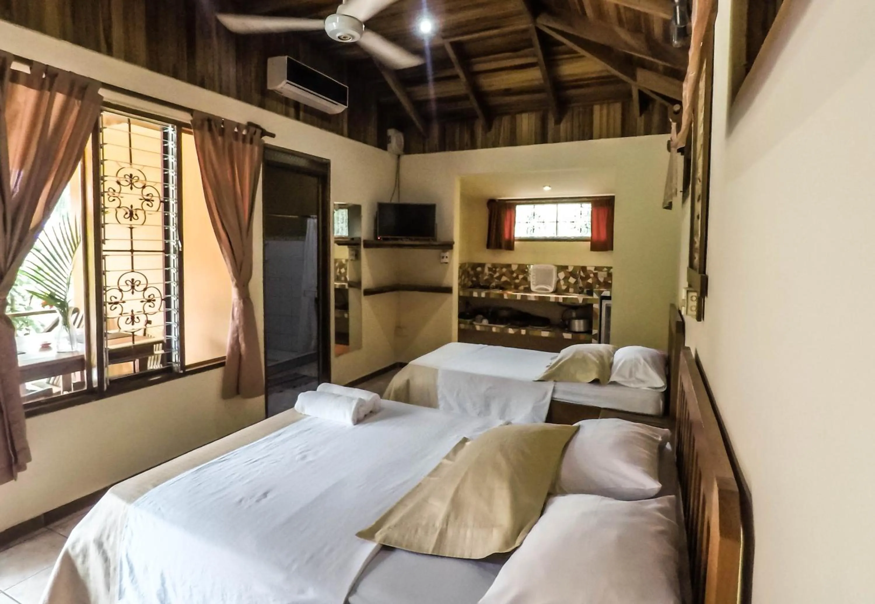 Bed in Hotel Ritmo Tropical - Pool and Breakfast