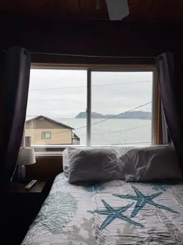 Bed in Curley's Resort & Dive Center Bed in Curley's Resort & Dive Center