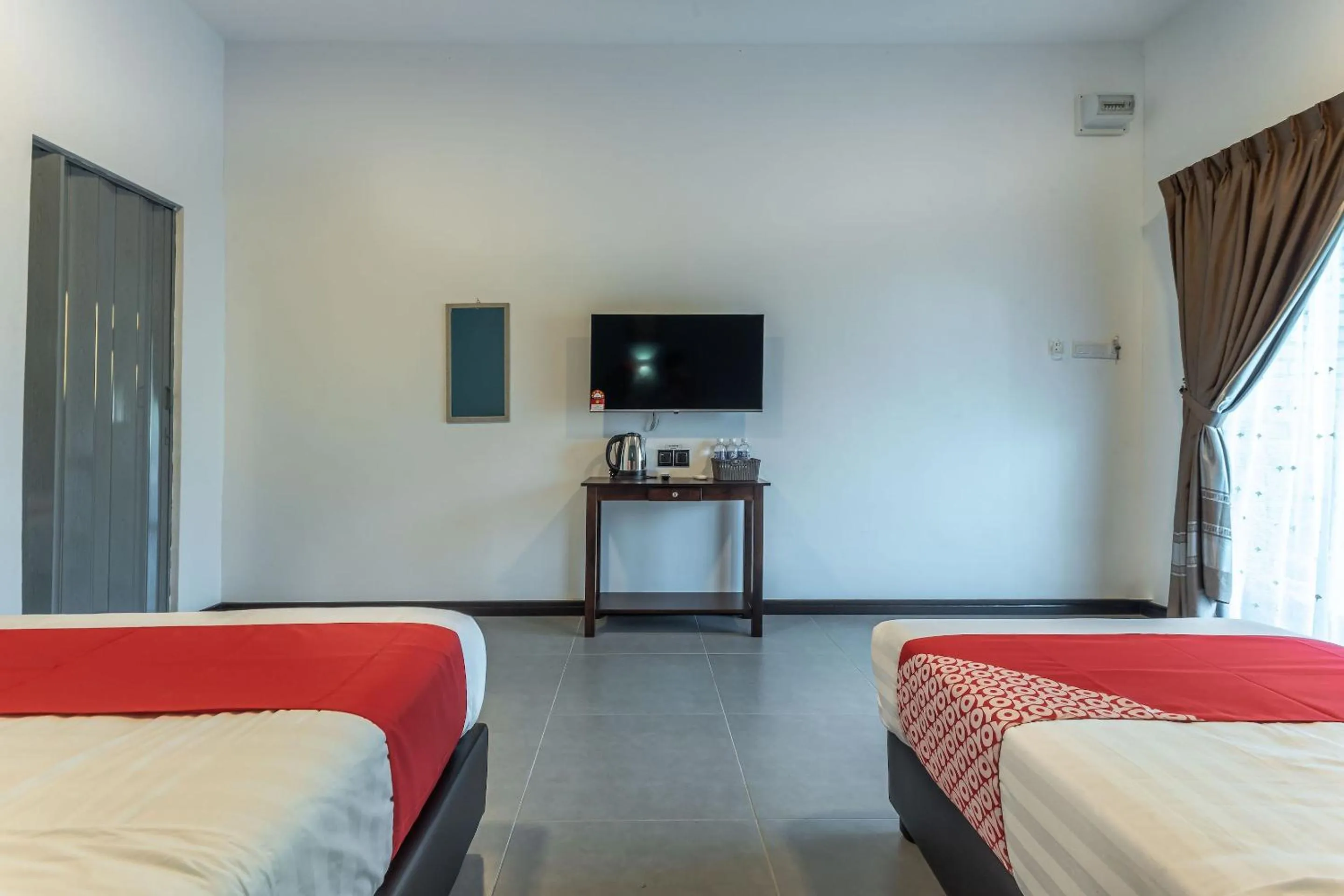 Bedroom in OYO 90149 Pua Family Semporna