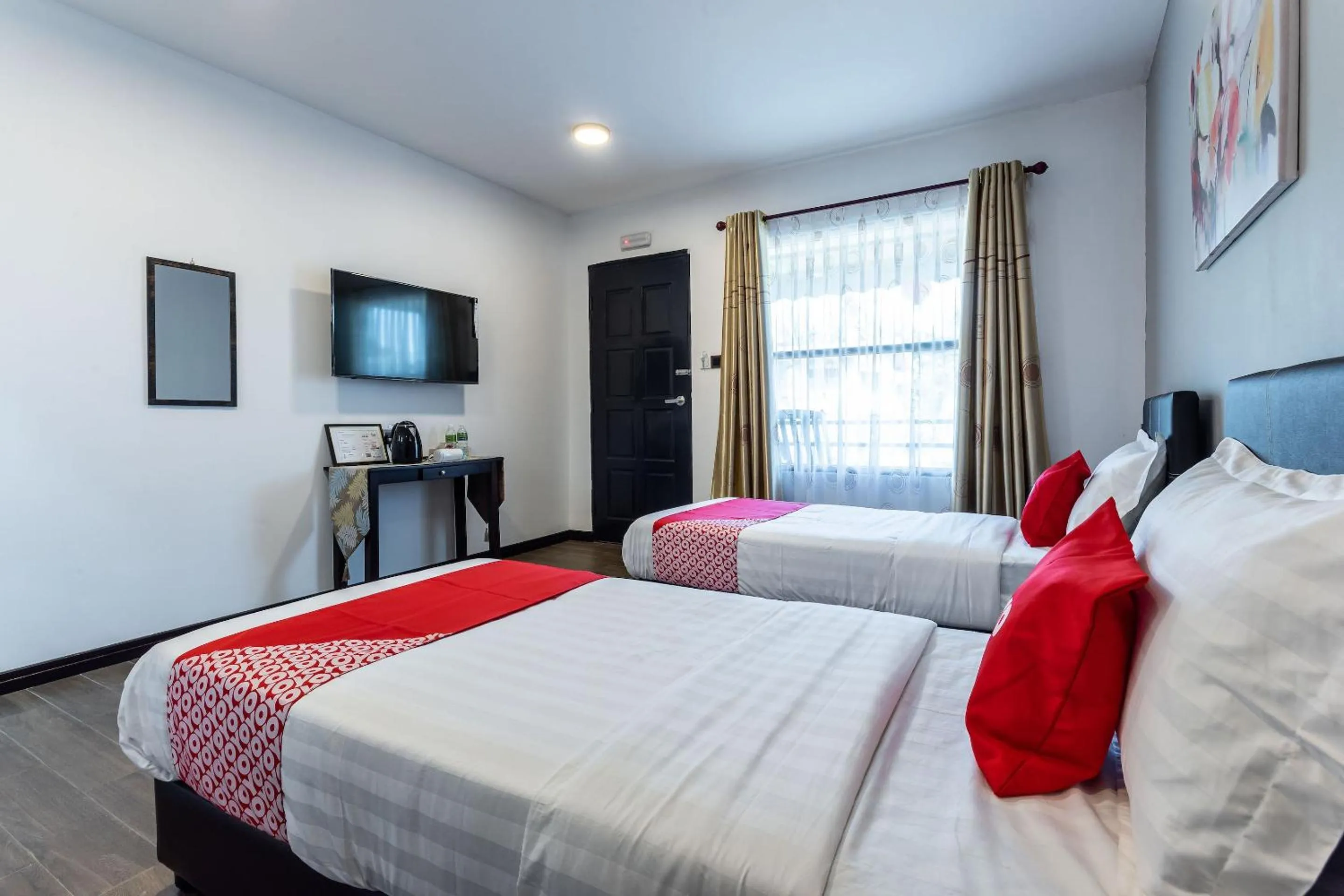 Bedroom in OYO 90149 Pua Family Semporna