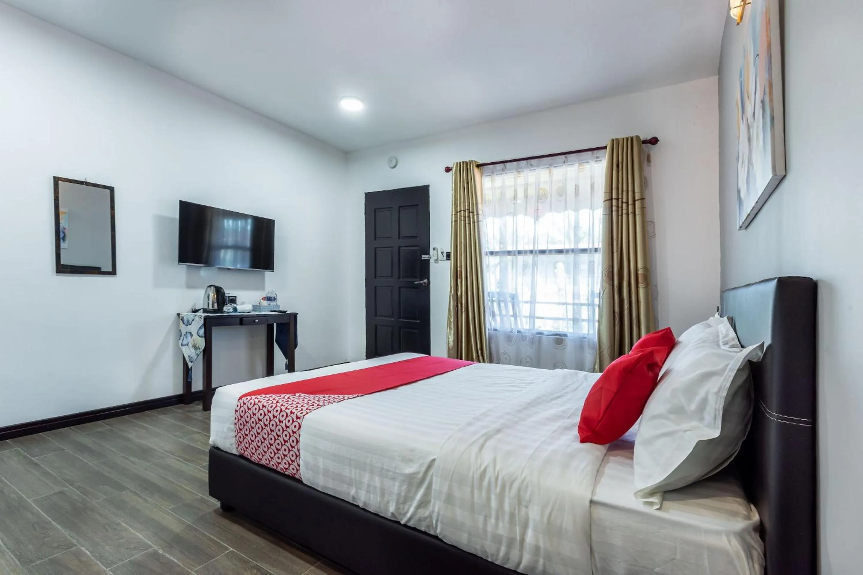 Bedroom in OYO 90149 Pua Family Semporna