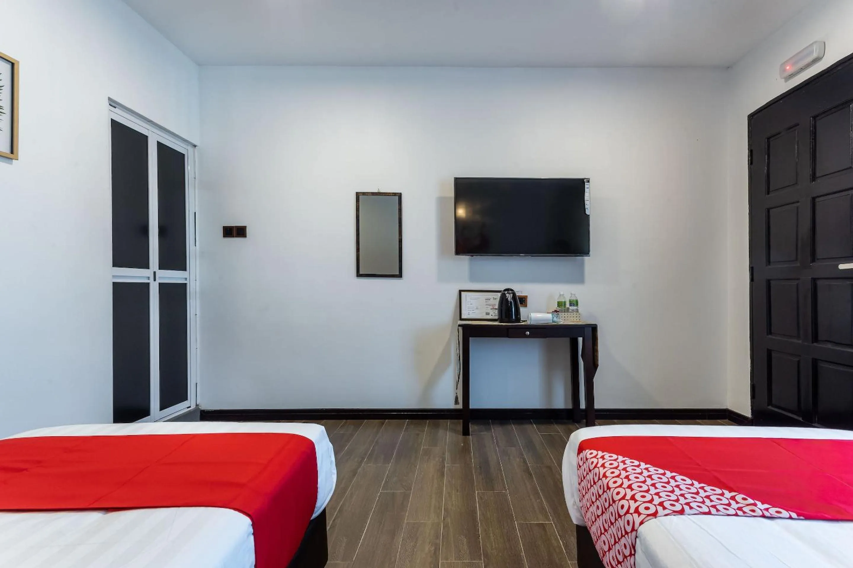 Bedroom in OYO 90149 Pua Family Semporna