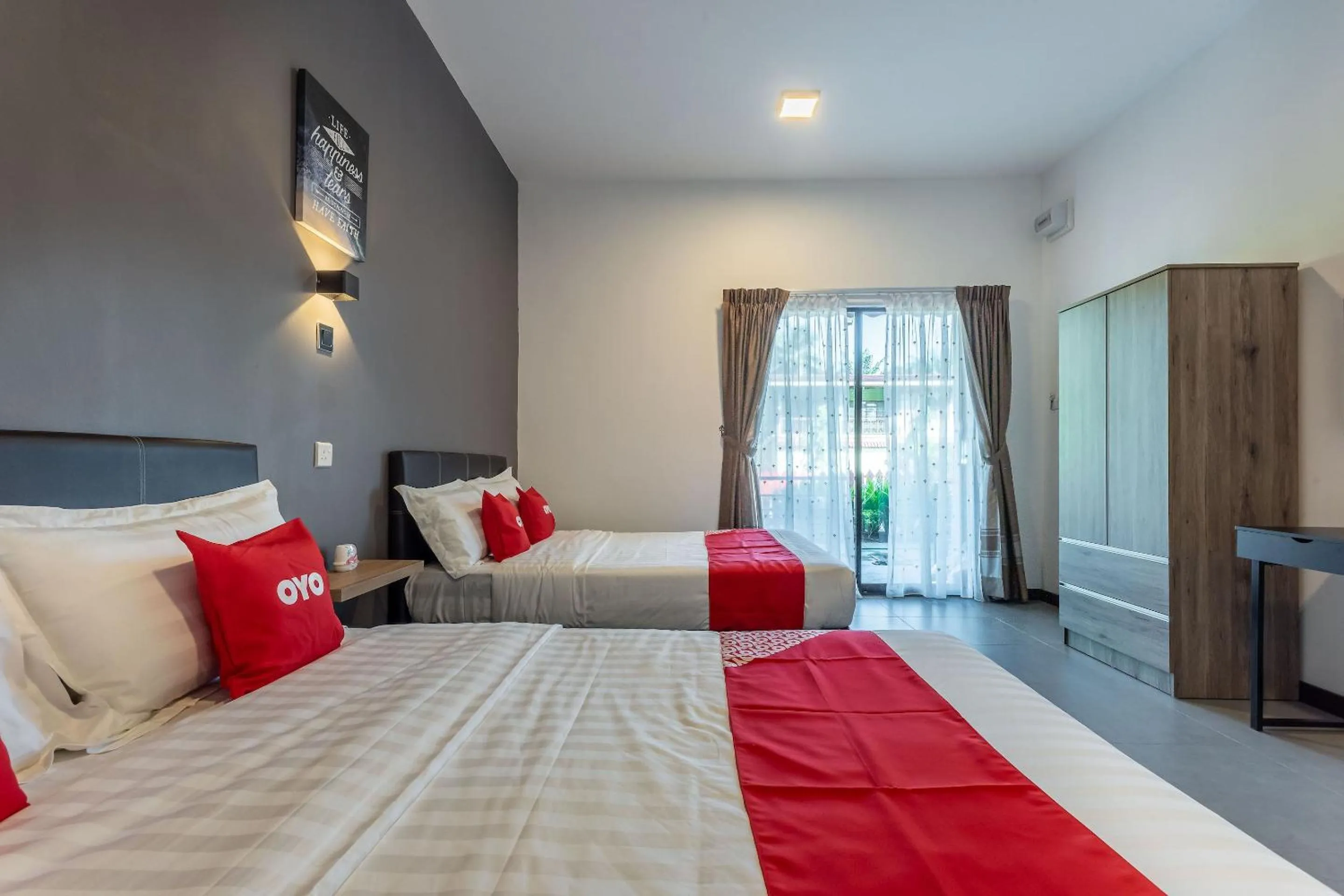 Bedroom in OYO 90149 Pua Family Semporna