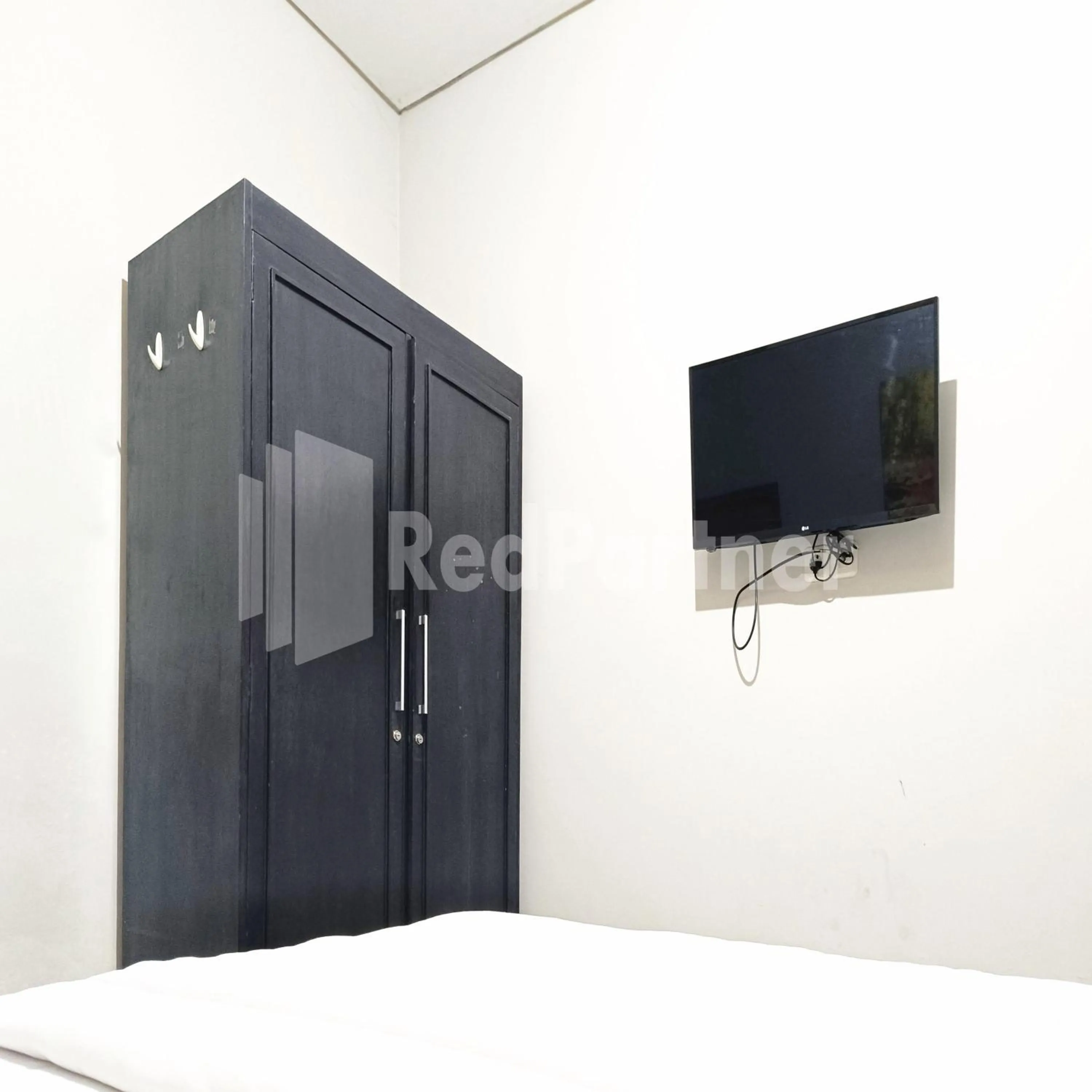Bedroom in D'Waru Homestay Syariah near Jl Slamet Riyadi Mitra RedDoorz