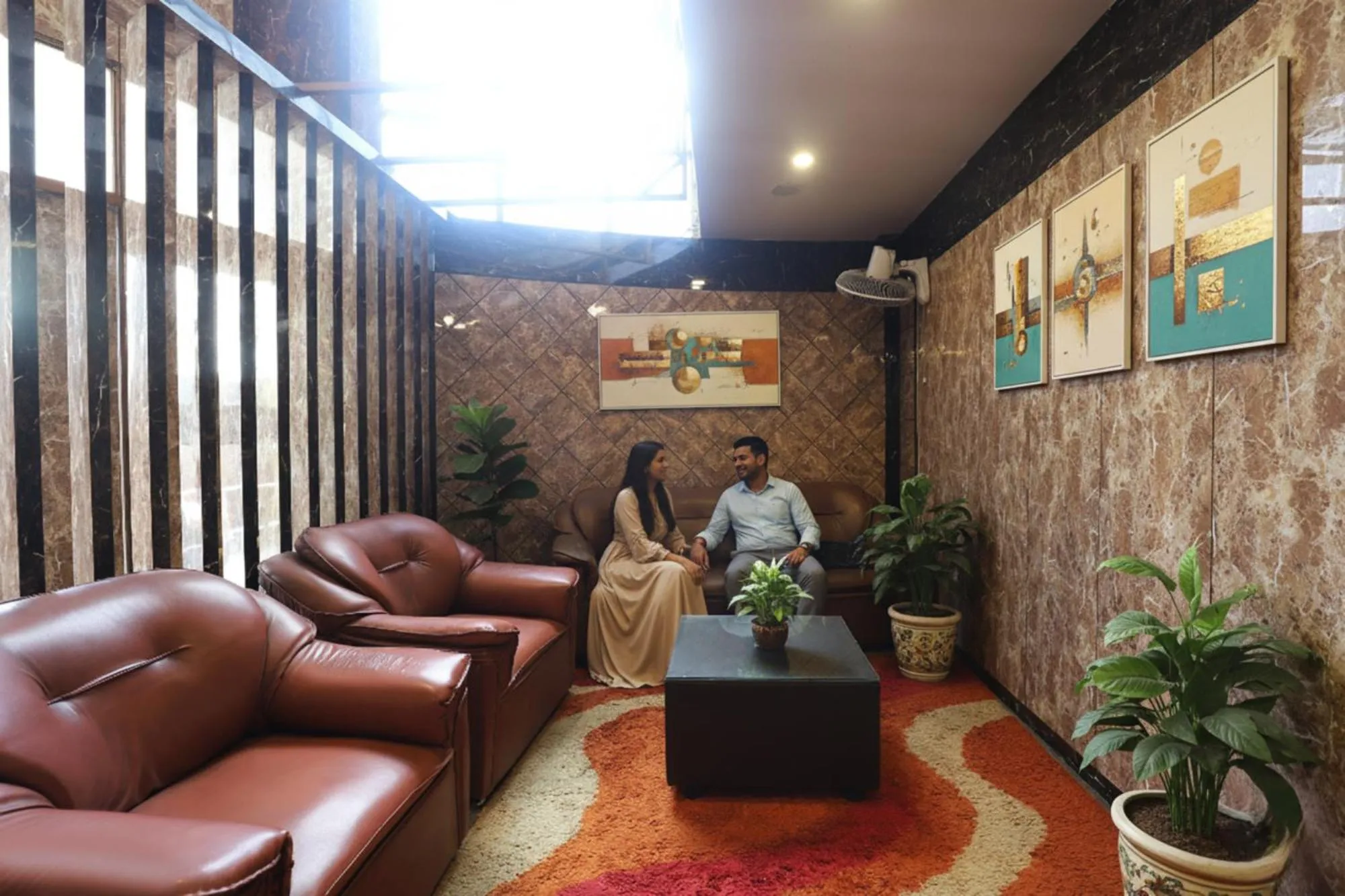 Seating area in FabHotel Chamiers Park - Nandanam