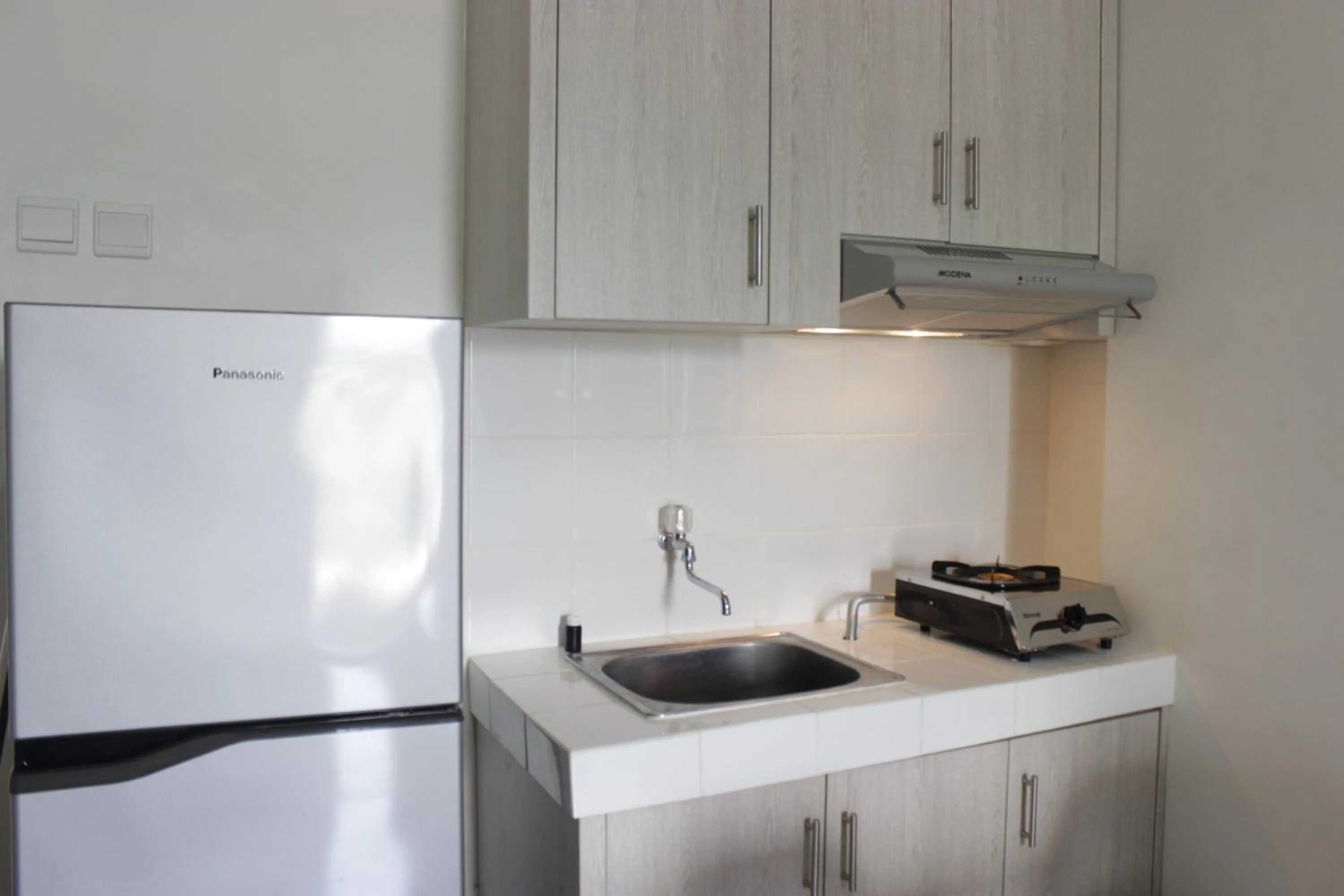 Kitchen or kitchenette in Spacious 3BR Apartment Parahyangan Residence near UNPAR By Travelio