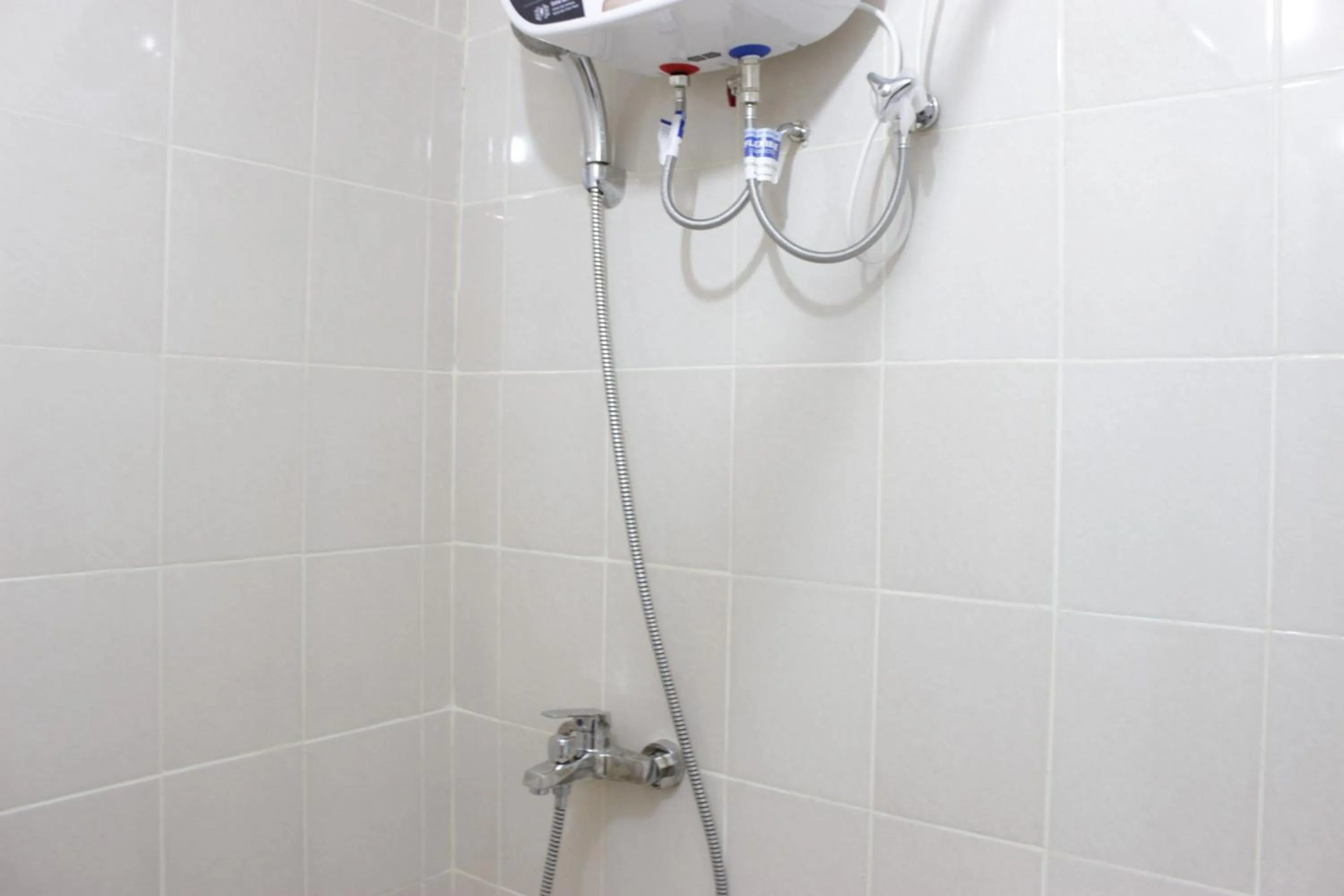 Bathroom in Spacious 3BR Apartment Parahyangan Residence near UNPAR By Travelio