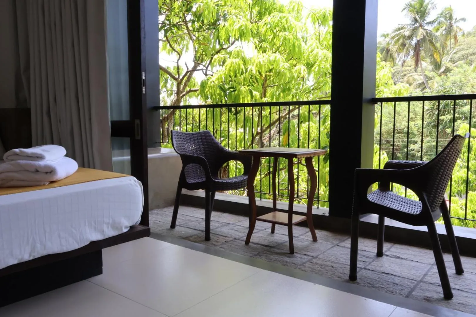 Patio, Bed in Handagedara Resort & Spa
