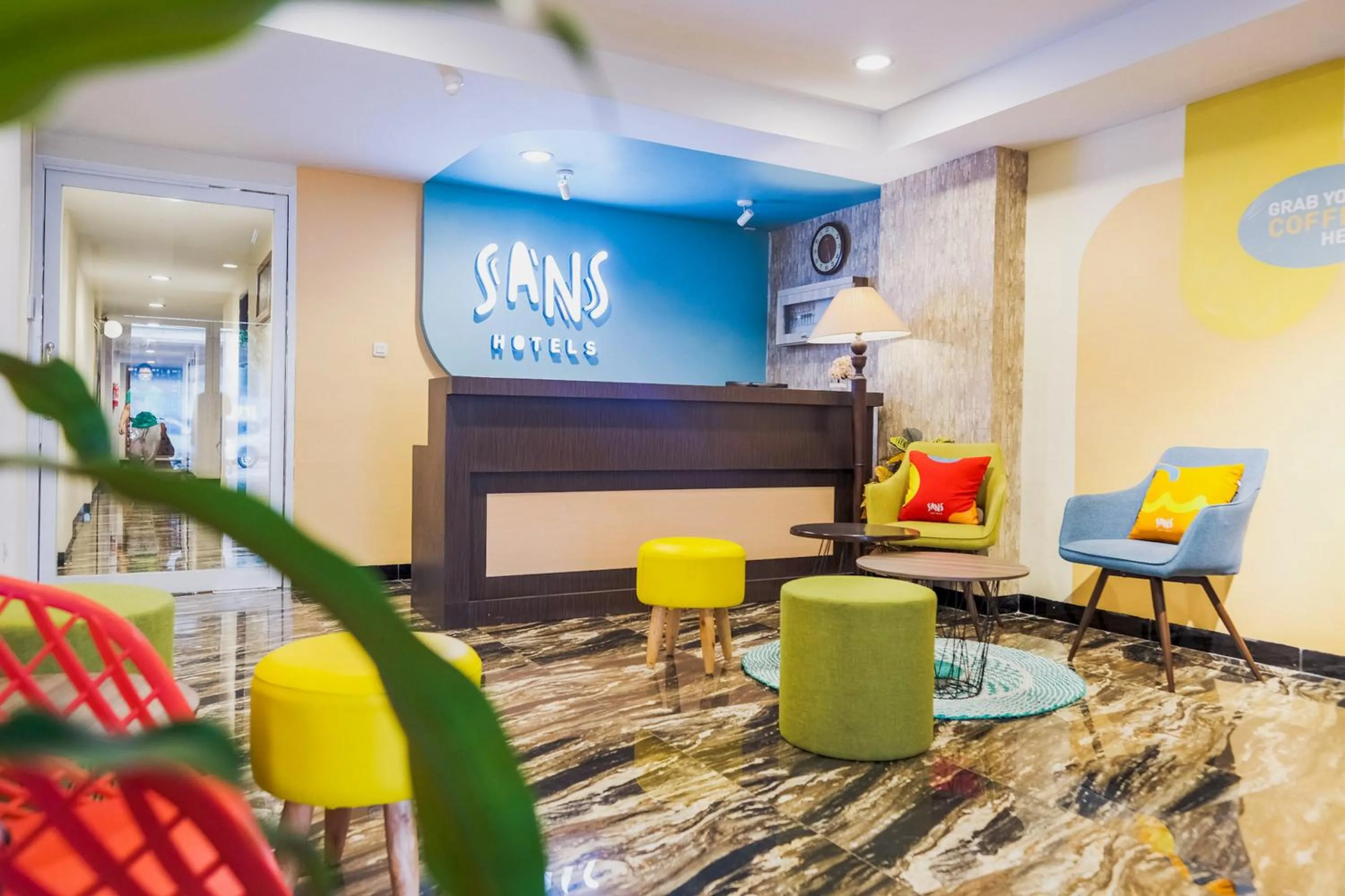Lobby or reception in Sans Hotel Cemara Asri Medan
