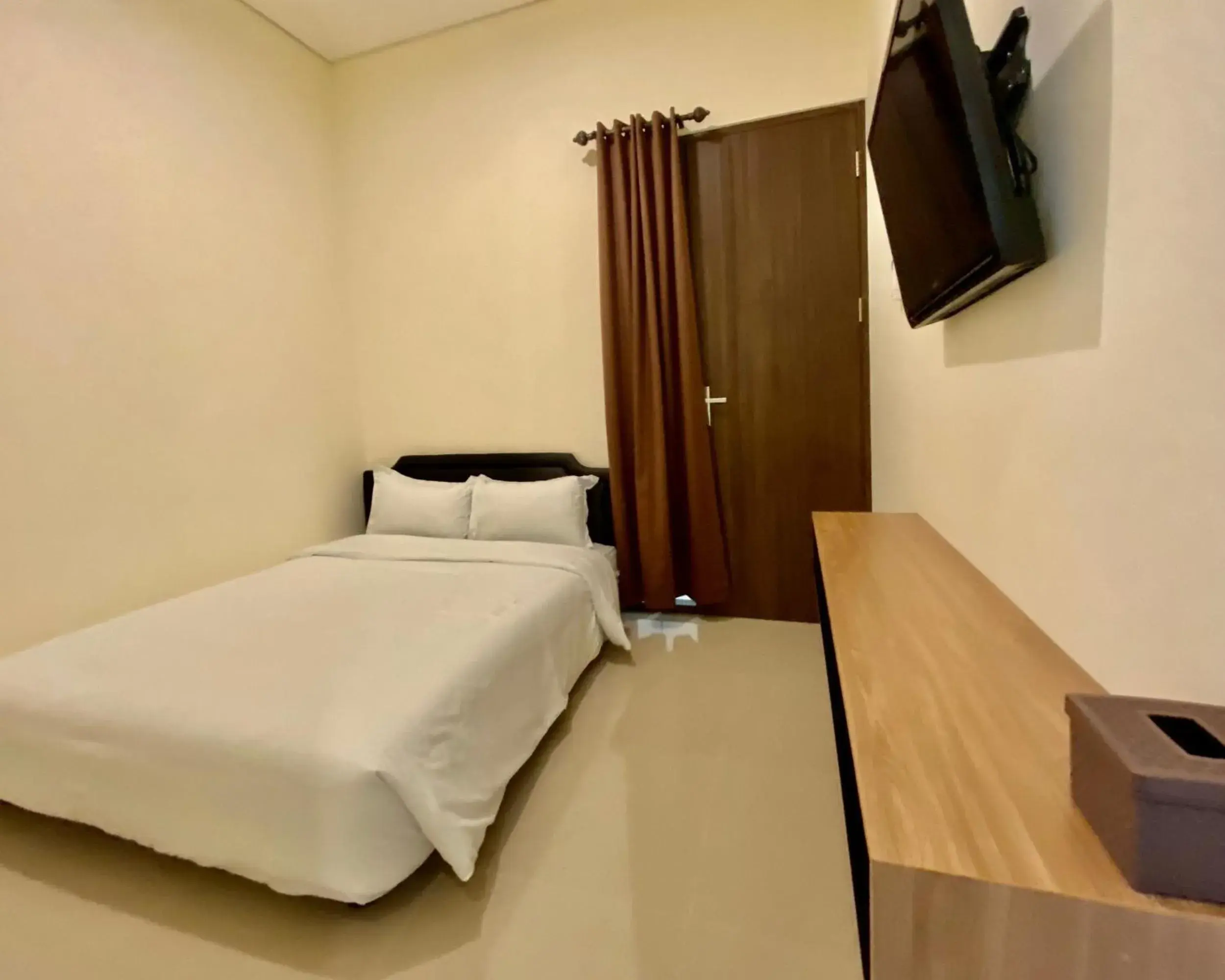 Bed in RedDoorz at Arkana Seturan Pakuwon Mall Bed in RedDoorz at Arkana Seturan Pakuwon Mall