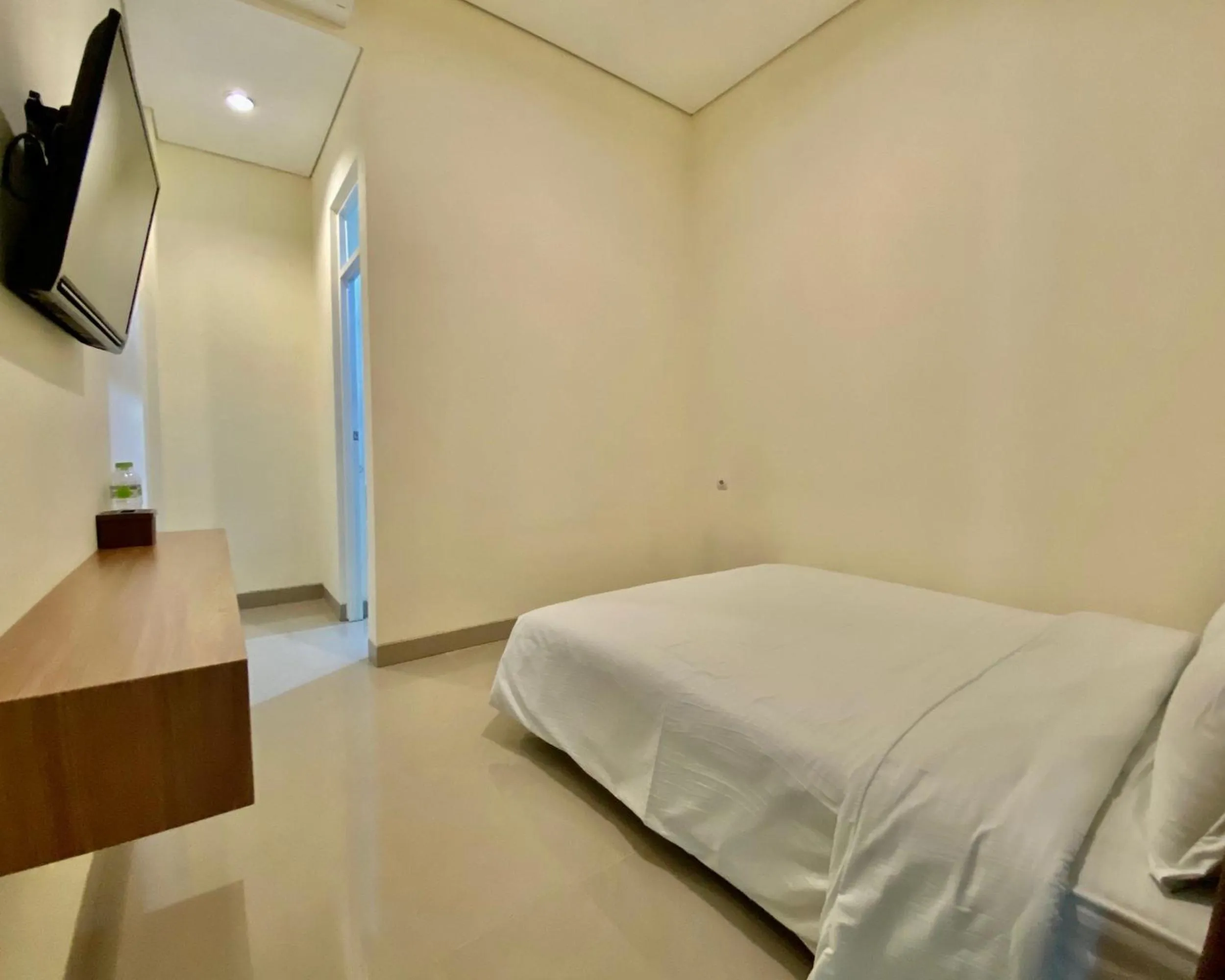 Bed in RedDoorz at Arkana Seturan Pakuwon Mall