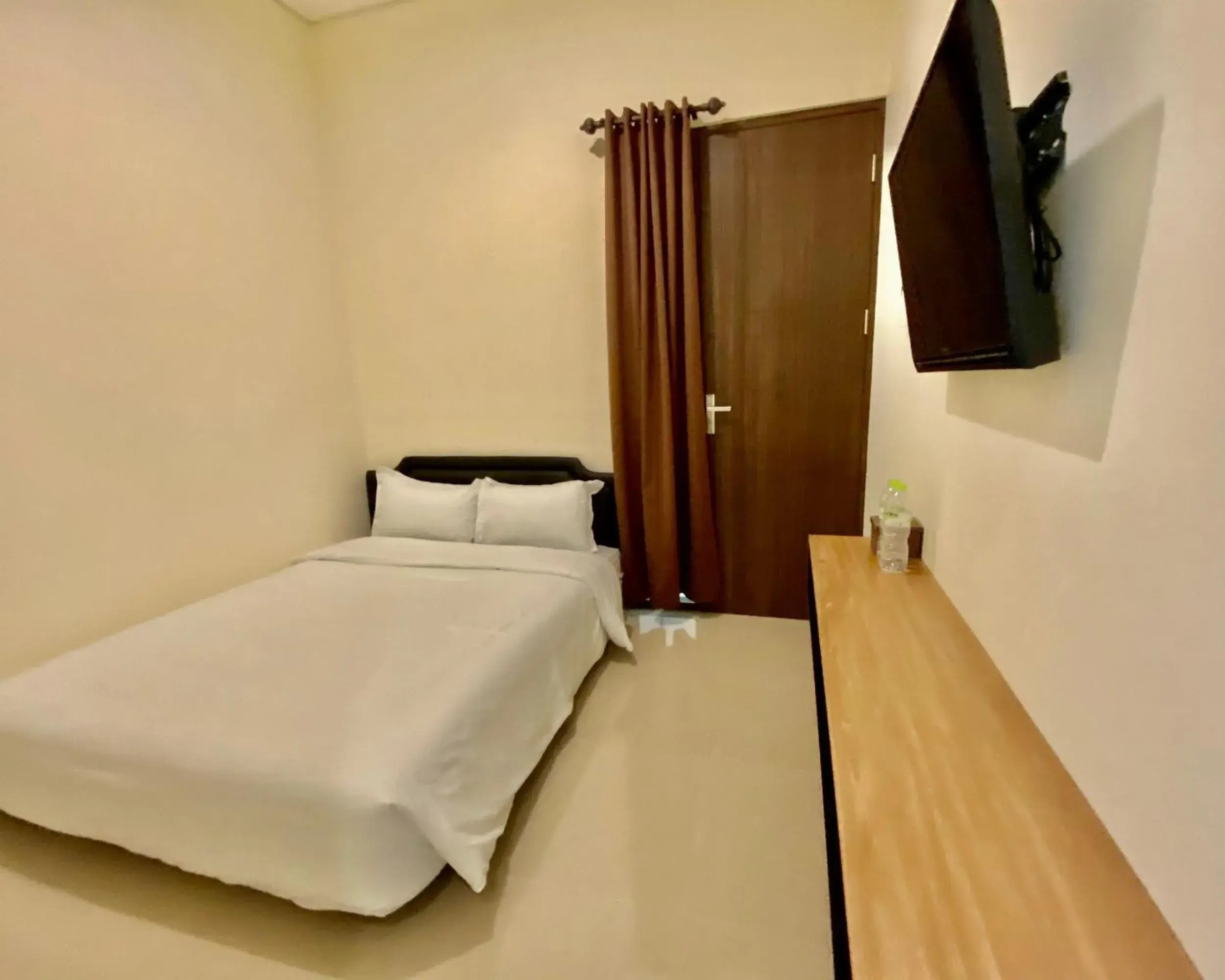 Bed in RedDoorz at Arkana Seturan Pakuwon Mall Bed in RedDoorz at Arkana Seturan Pakuwon Mall