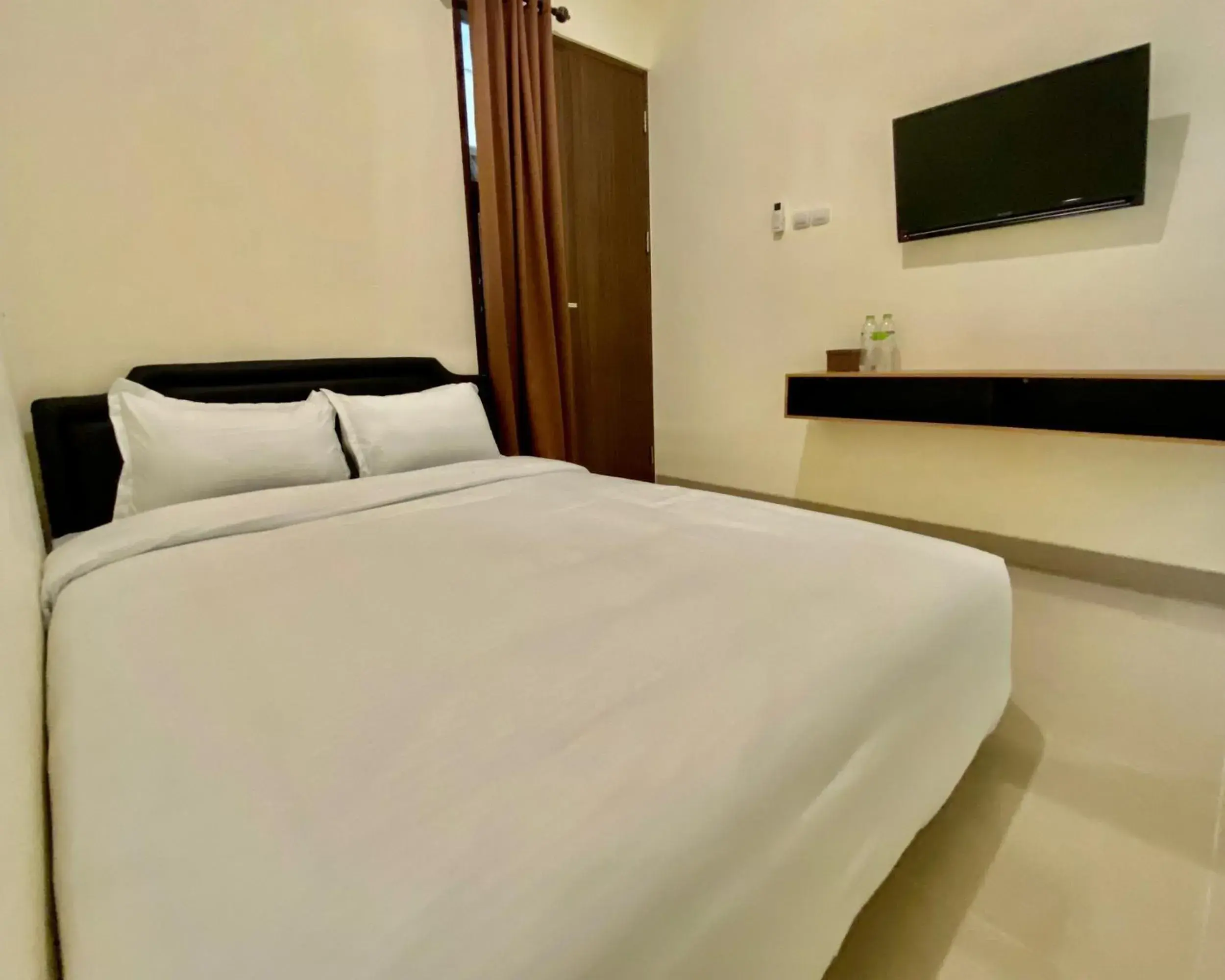 Bed in RedDoorz at Arkana Seturan Pakuwon Mall Bed in RedDoorz at Arkana Seturan Pakuwon Mall