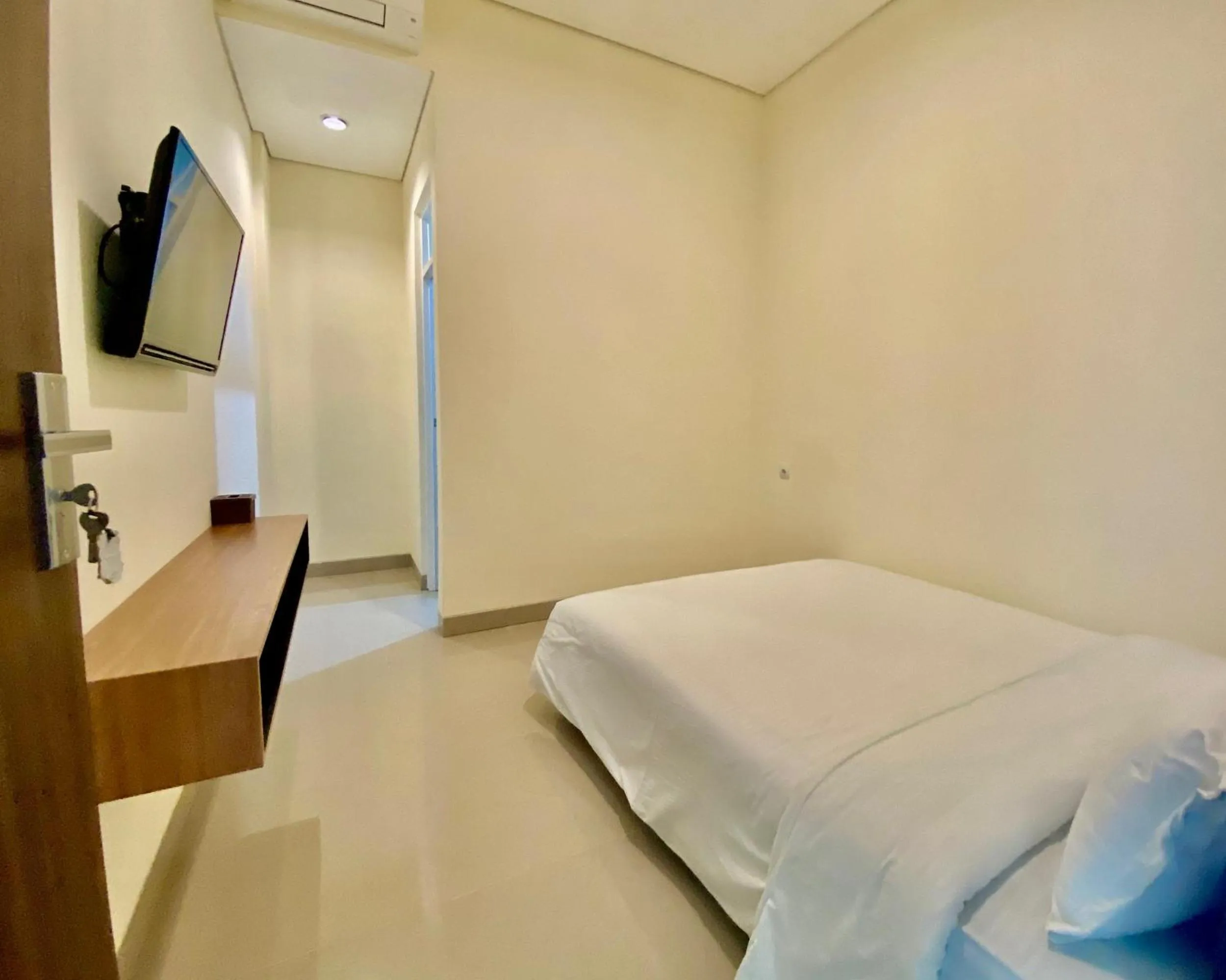 Bed in RedDoorz at Arkana Seturan Pakuwon Mall