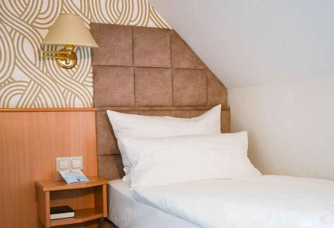 Bed in Hotel Marschall Duroc