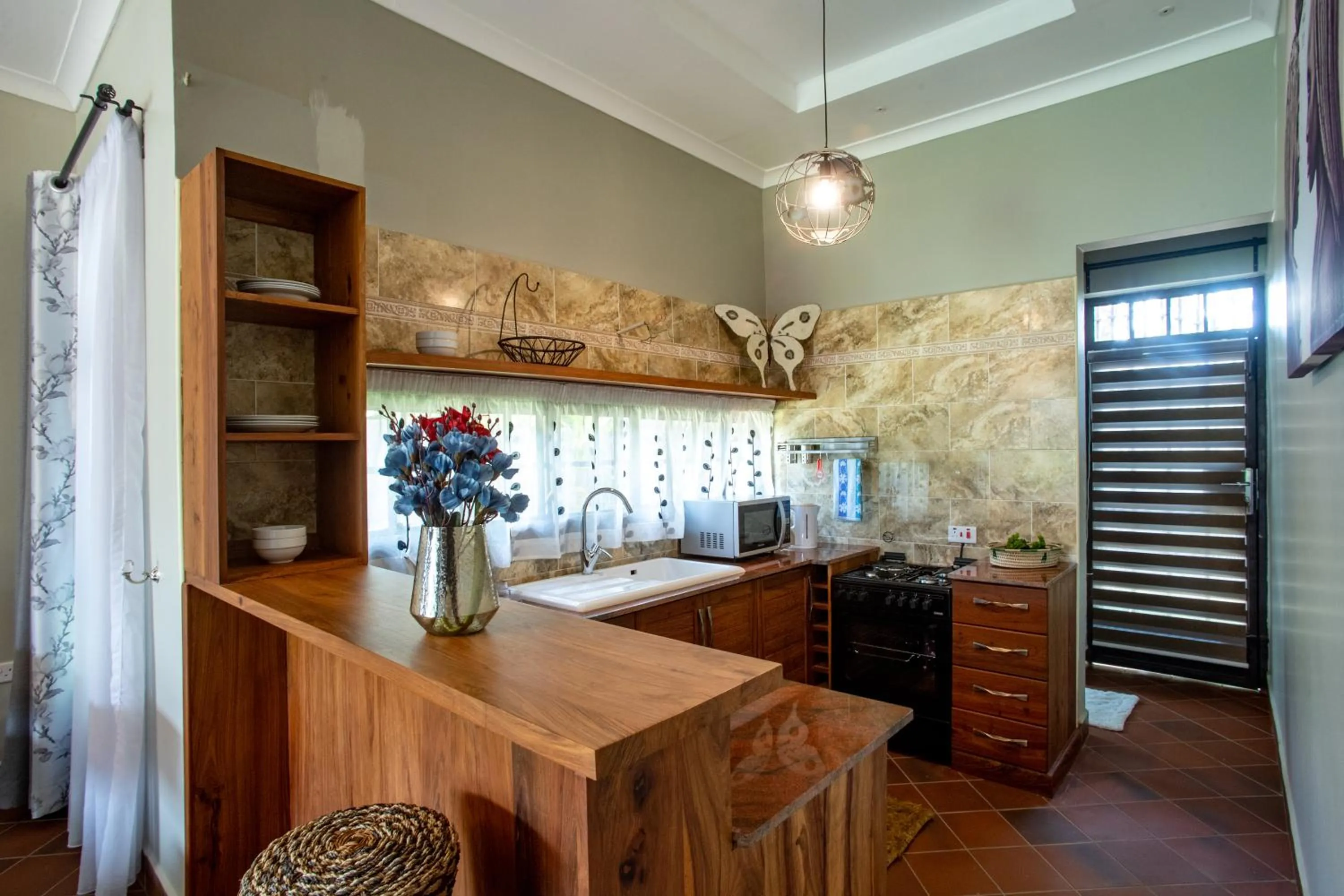 Kitchen or kitchenette in Kinga Homes Boutique Hotel