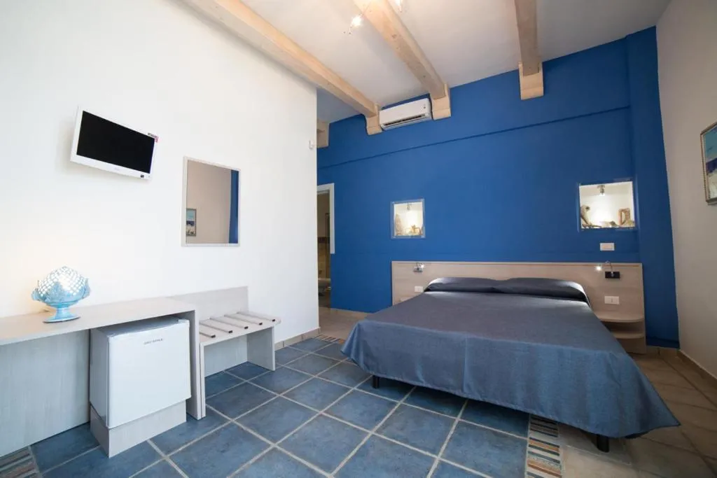 Bed in La Giara Resort