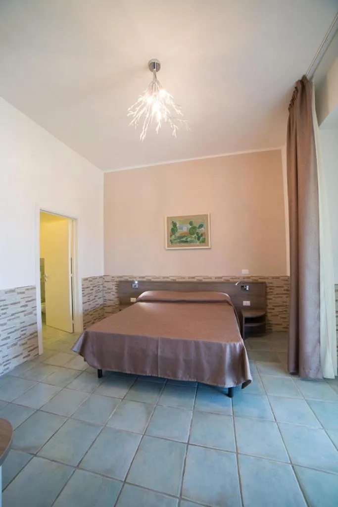 Bed in La Giara Resort