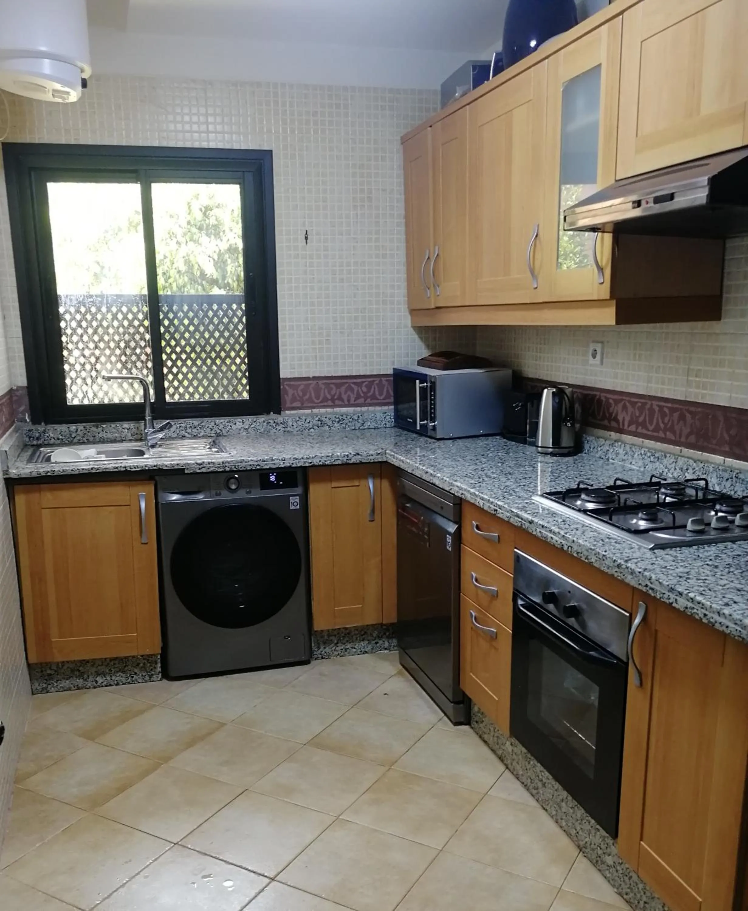 Kitchen or kitchenette in La Perle de l'Atlas by Golf Resort
