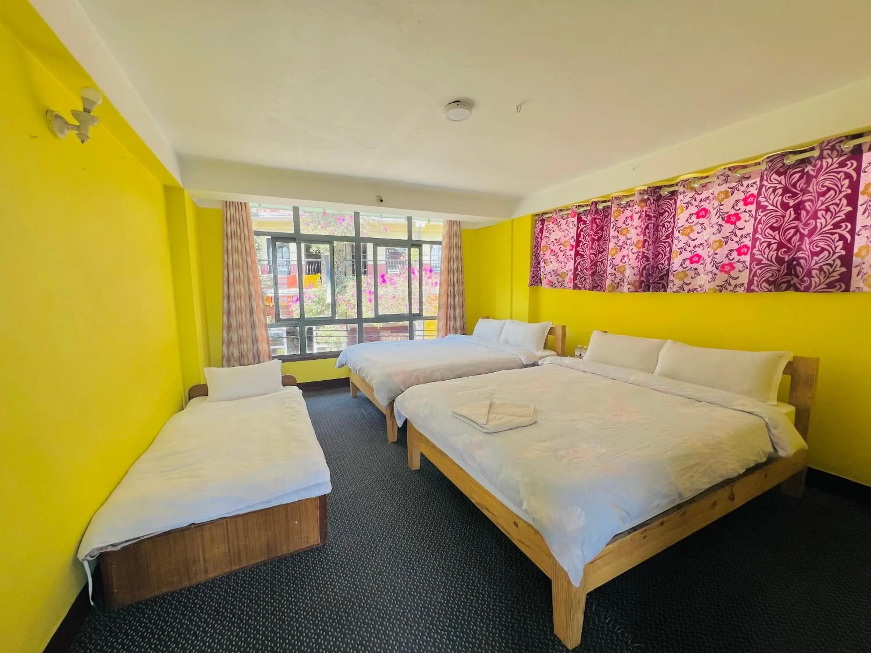 Family Room with Balcony in Hotel New Dragon Family Room with Balcony in Hotel New Dragon