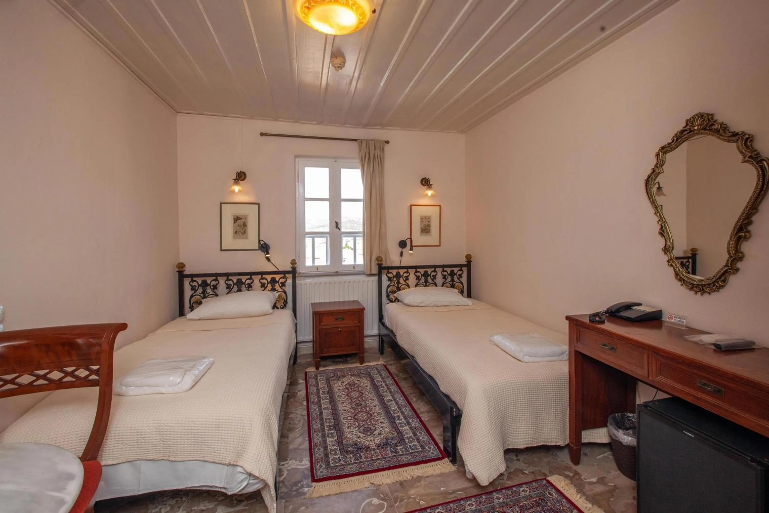 Bed in Byron Traditional Hotel