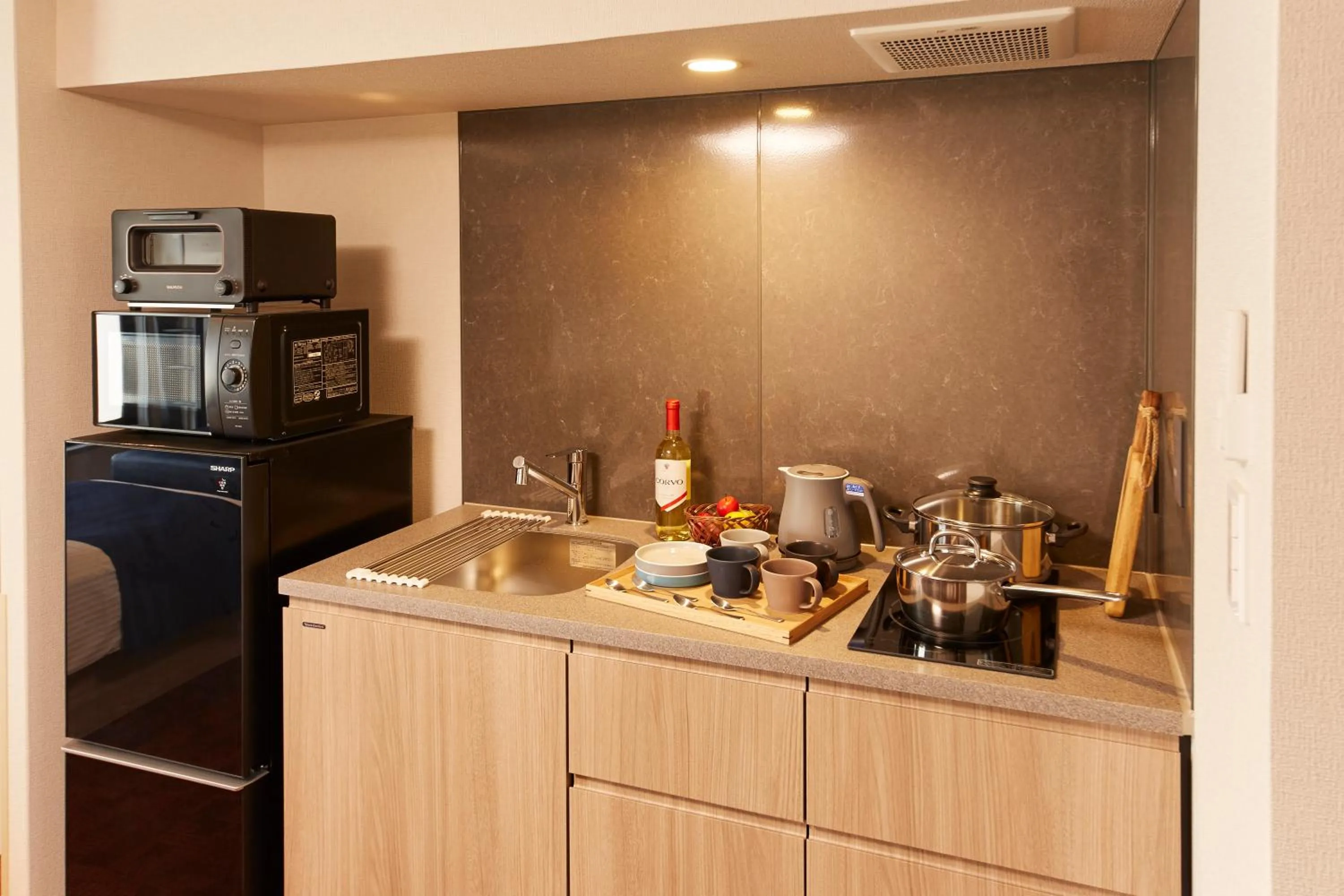 Kitchen or kitchenette in MONday Apart Premium KYOTO Station