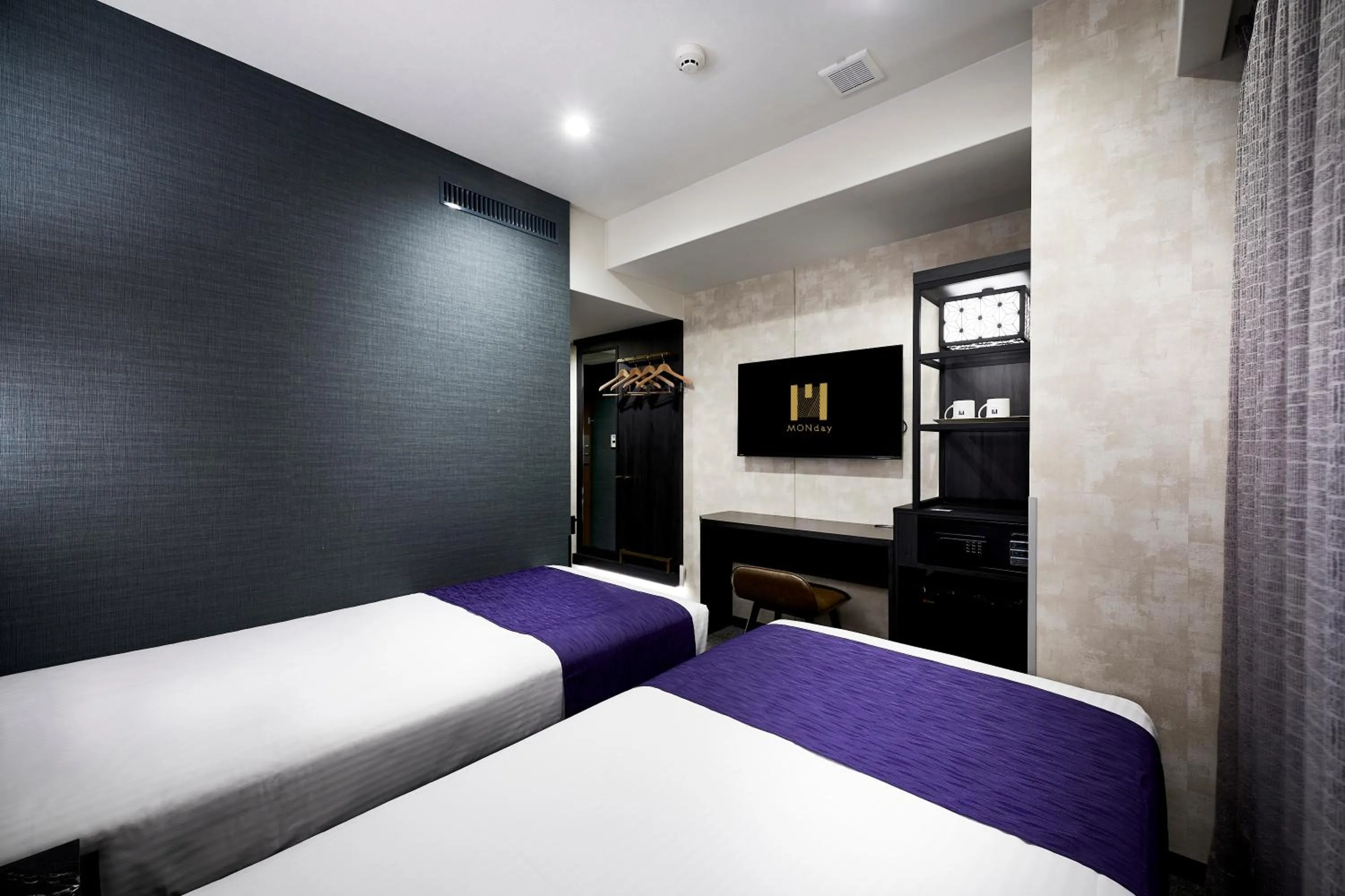 Bed in hotel MONday KYOTO MARUTAMACHI