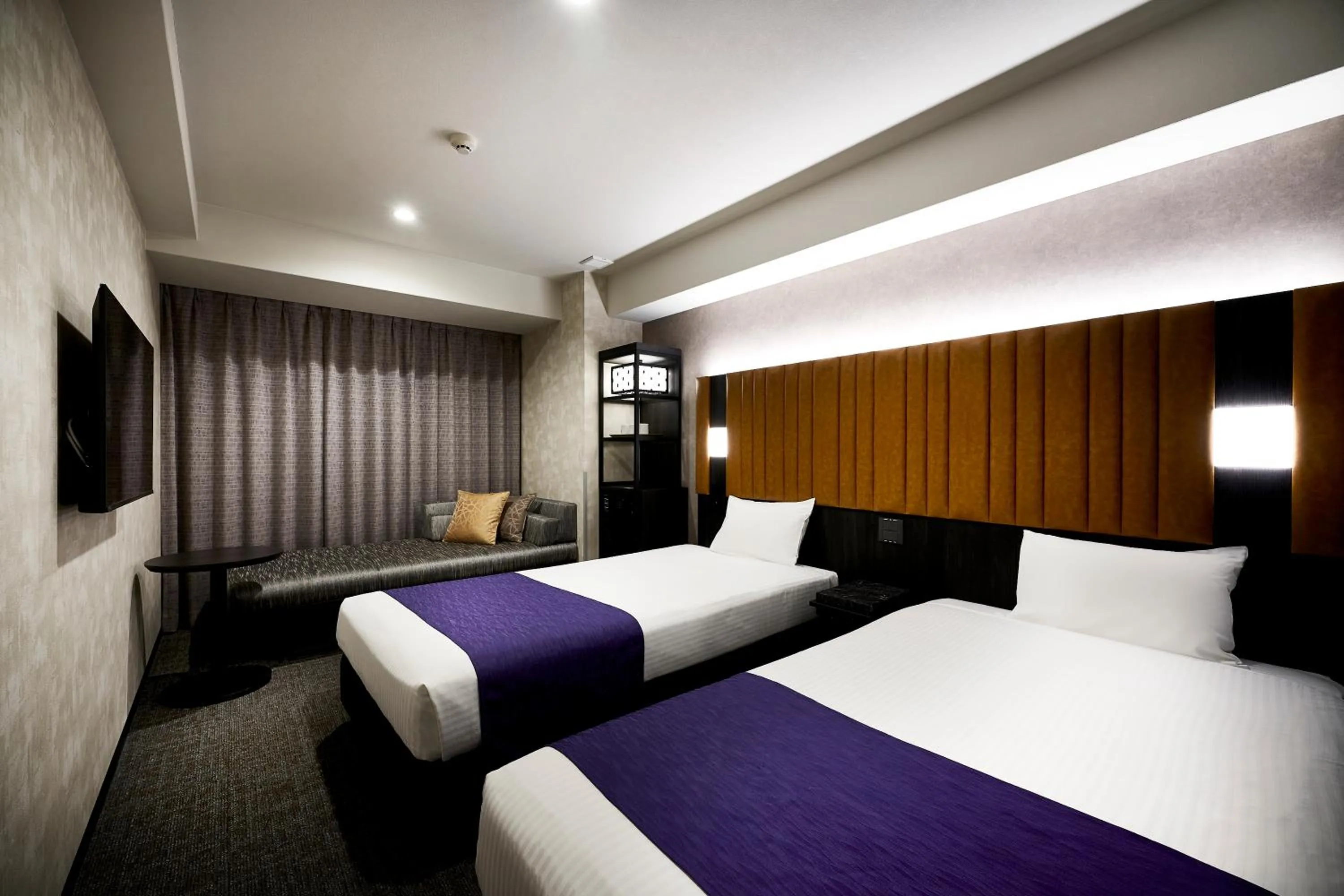 Bed in hotel MONday KYOTO MARUTAMACHI