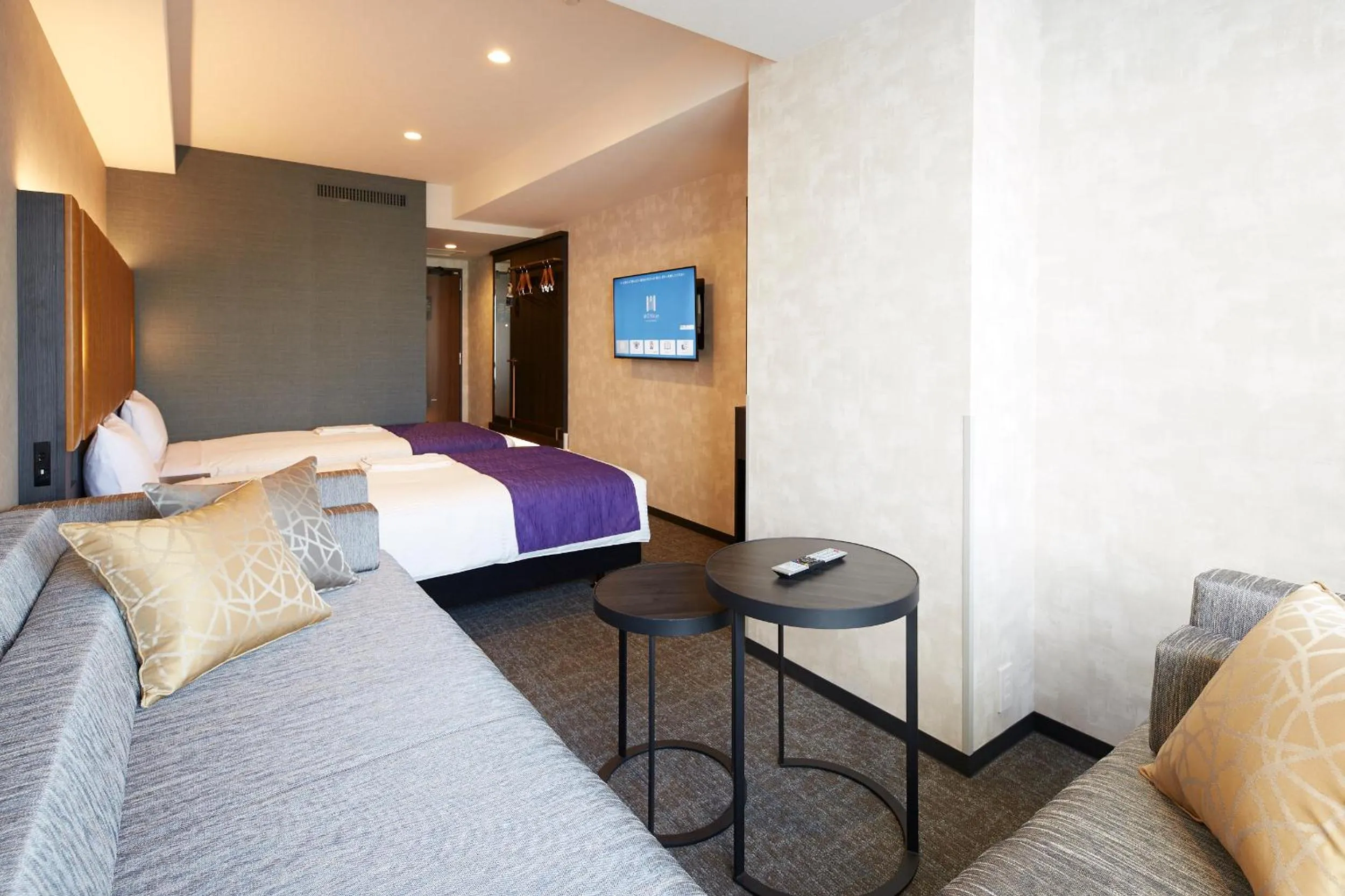 Bed in hotel MONday KYOTO MARUTAMACHI