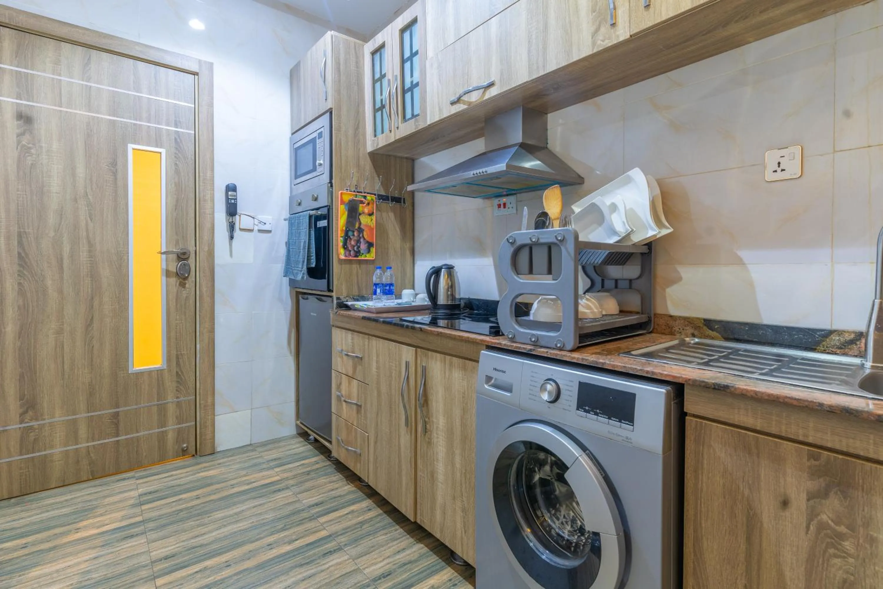 kitchen in God's Touch Apartments Signature