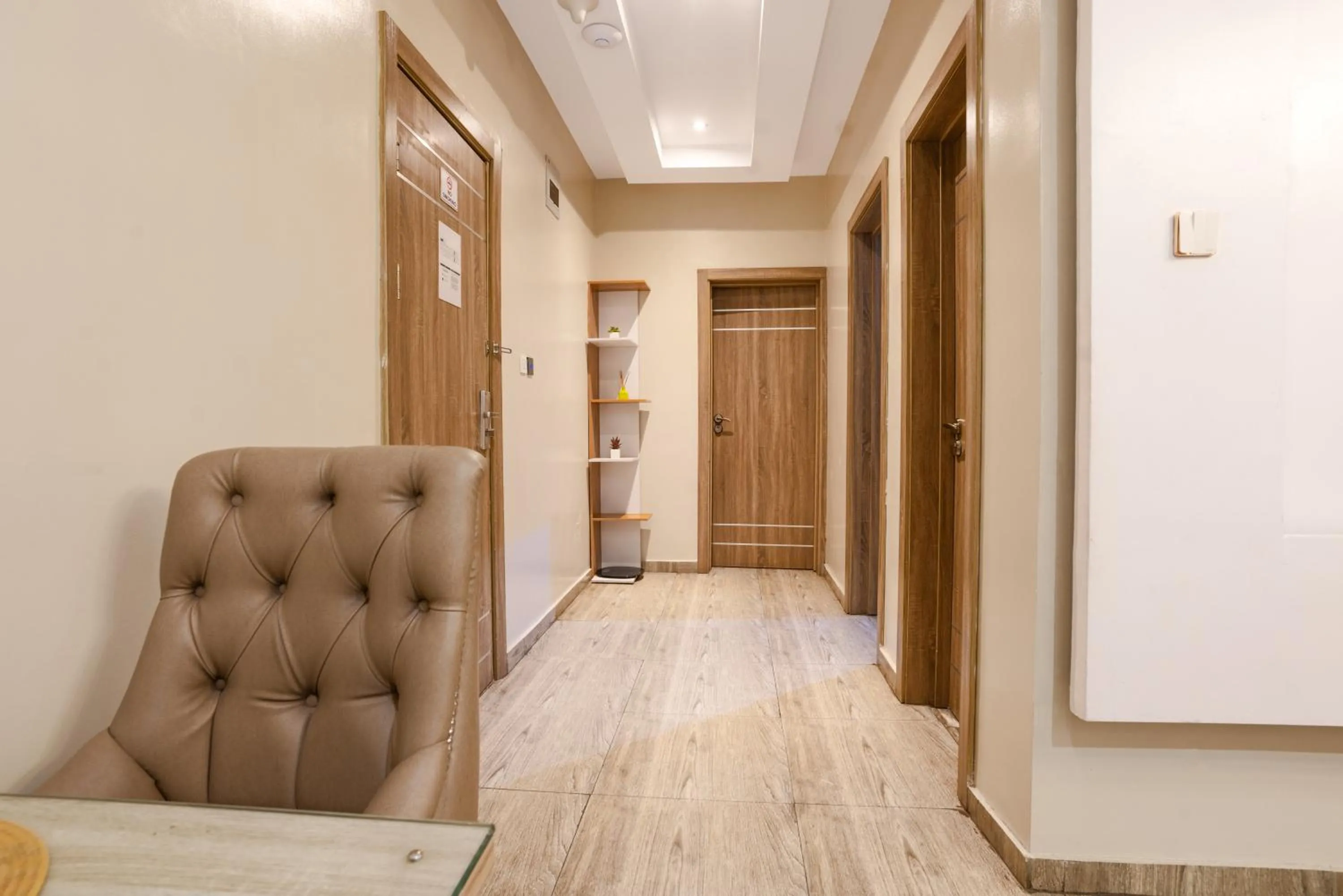 Living room in God's Touch Apartments Signature