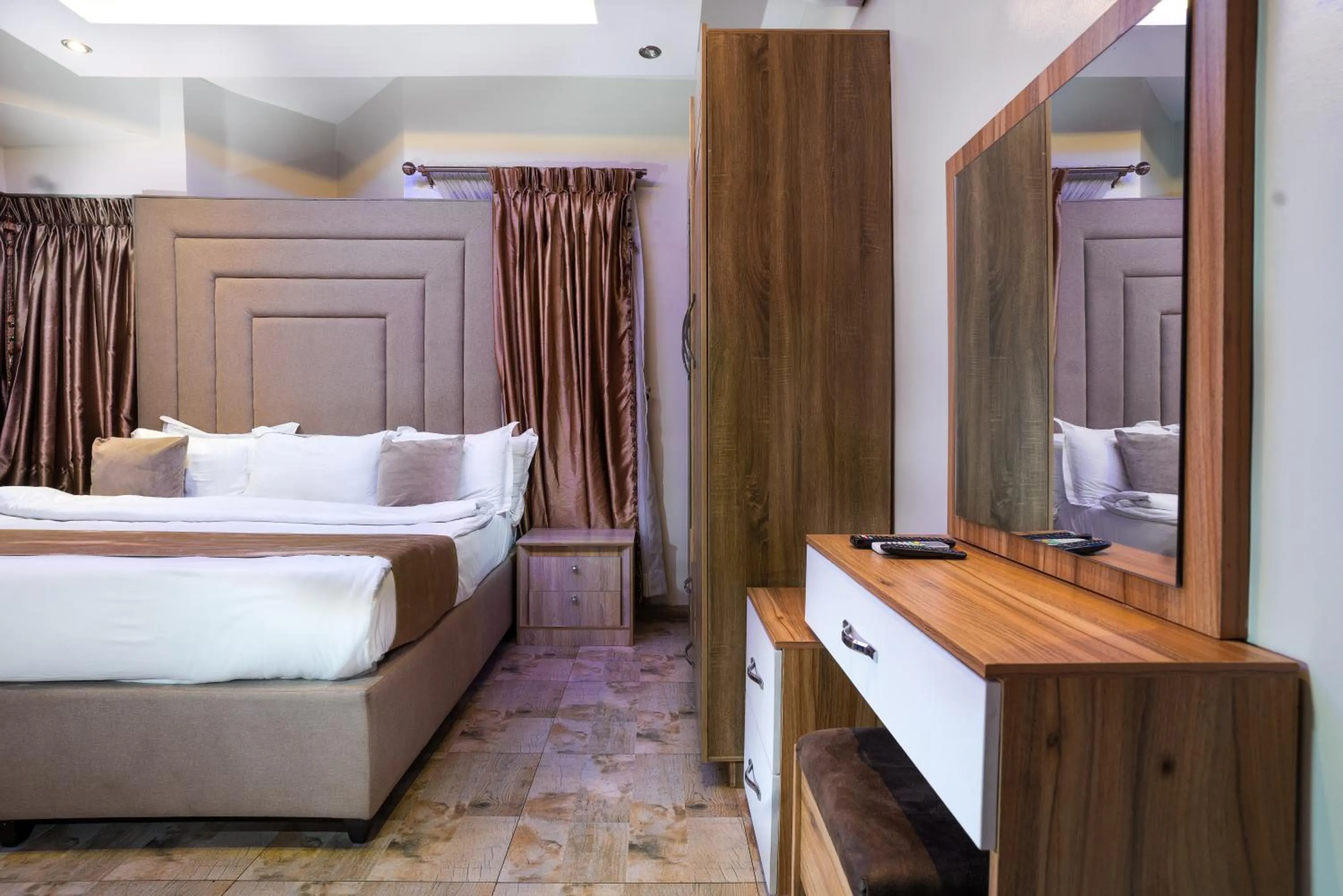 Bedroom, Bed in God's Touch Apartments Signature