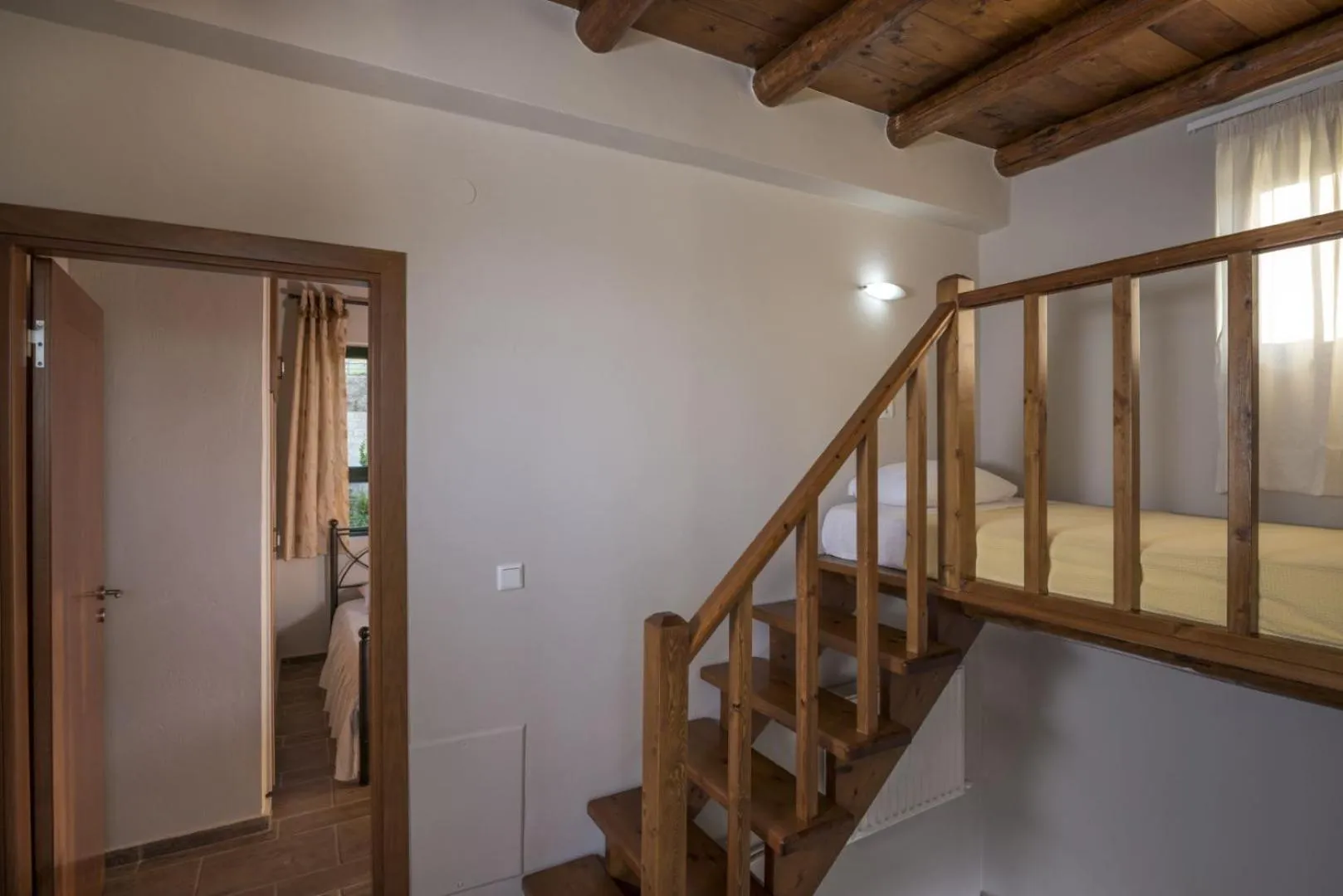 Bed in Athina Luxury Villas