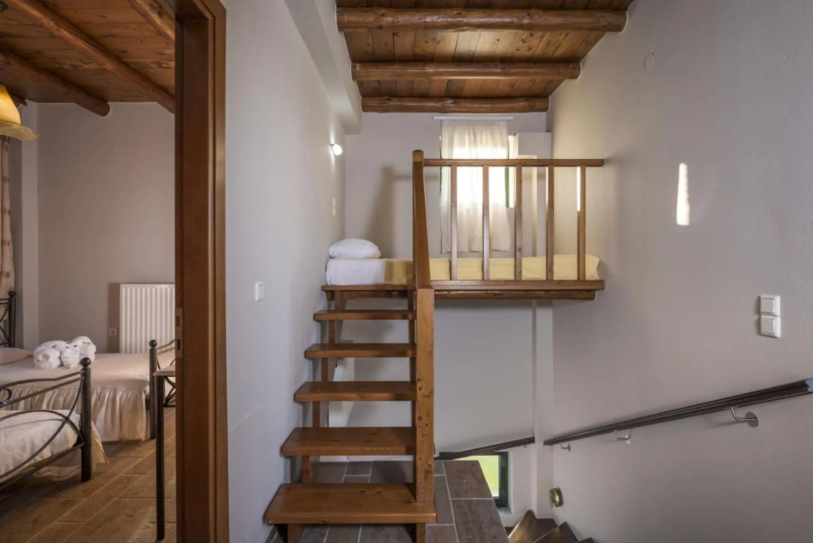 Bed in Athina Luxury Villas