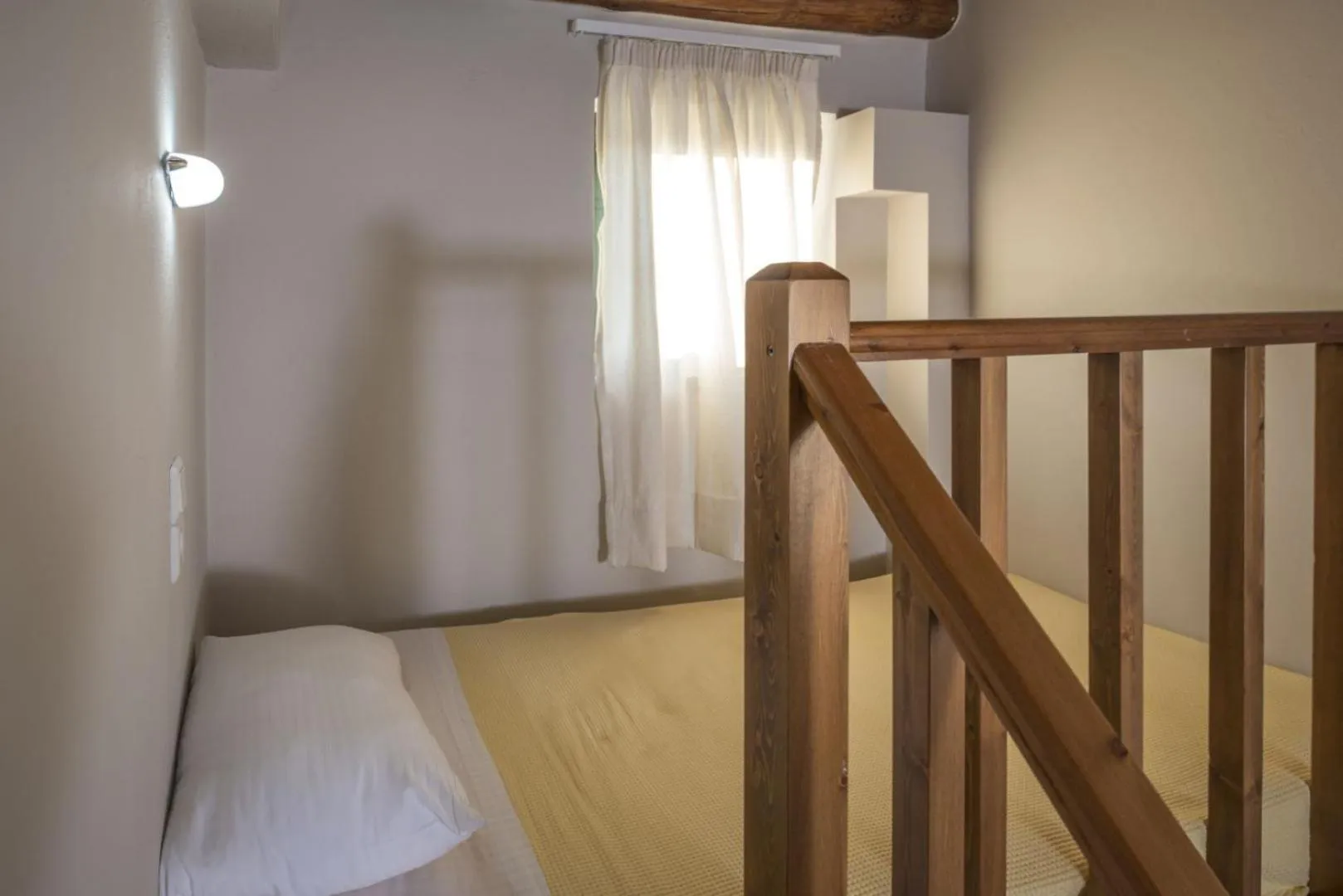 Bed in Athina Luxury Villas