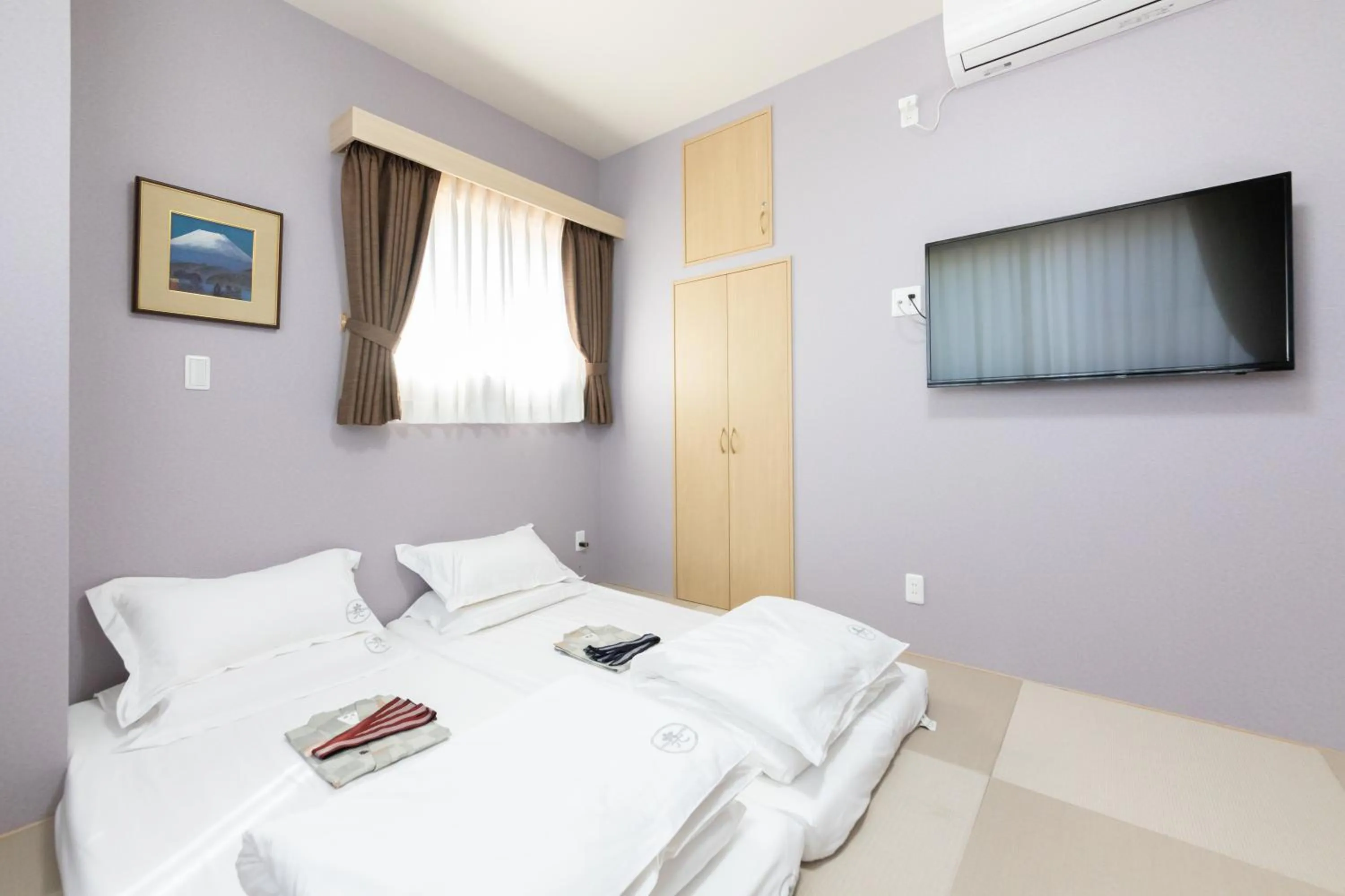 Bed in 灯光旅館 Light hotel