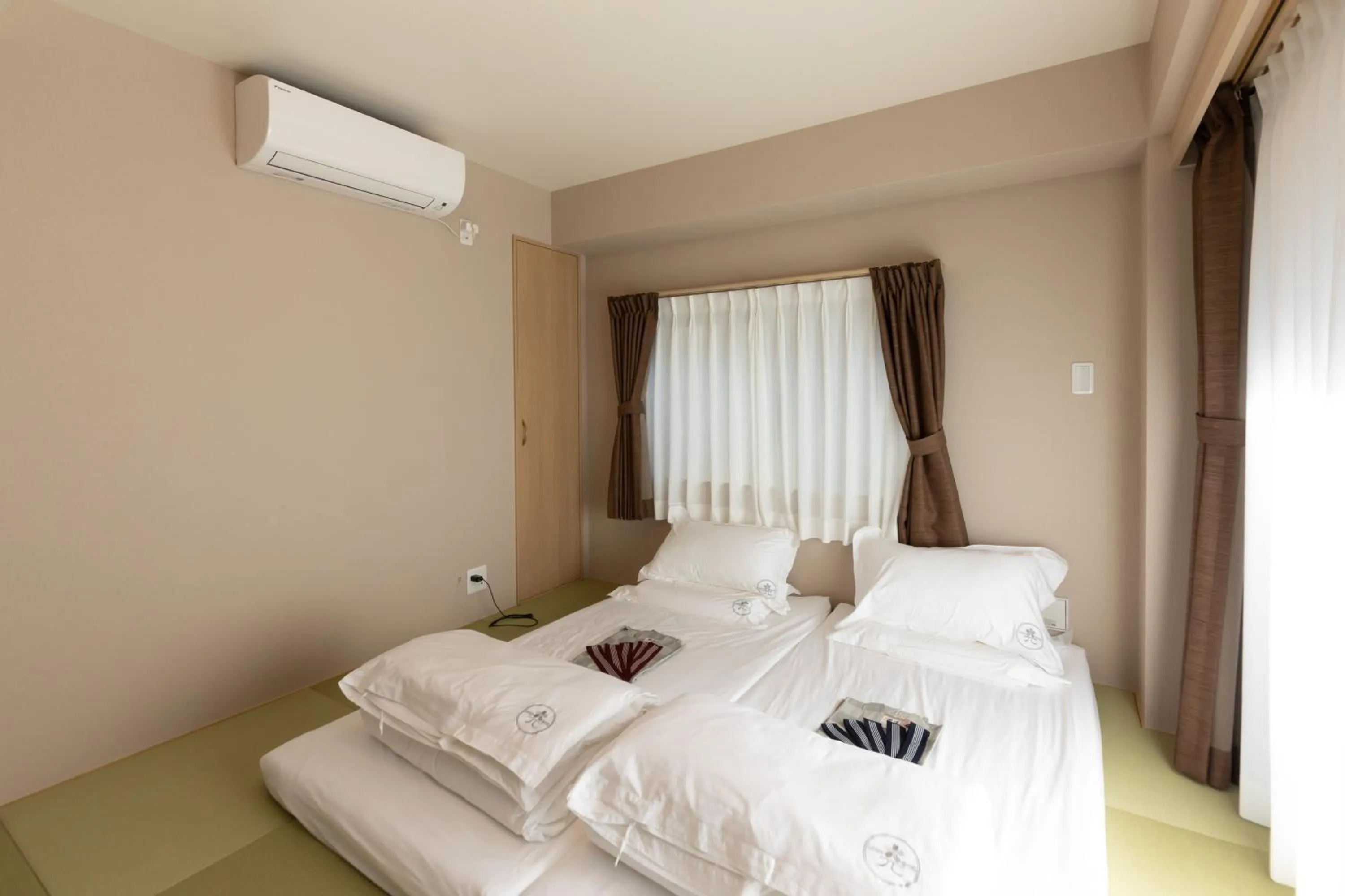 Bed in 灯光旅館 Light hotel