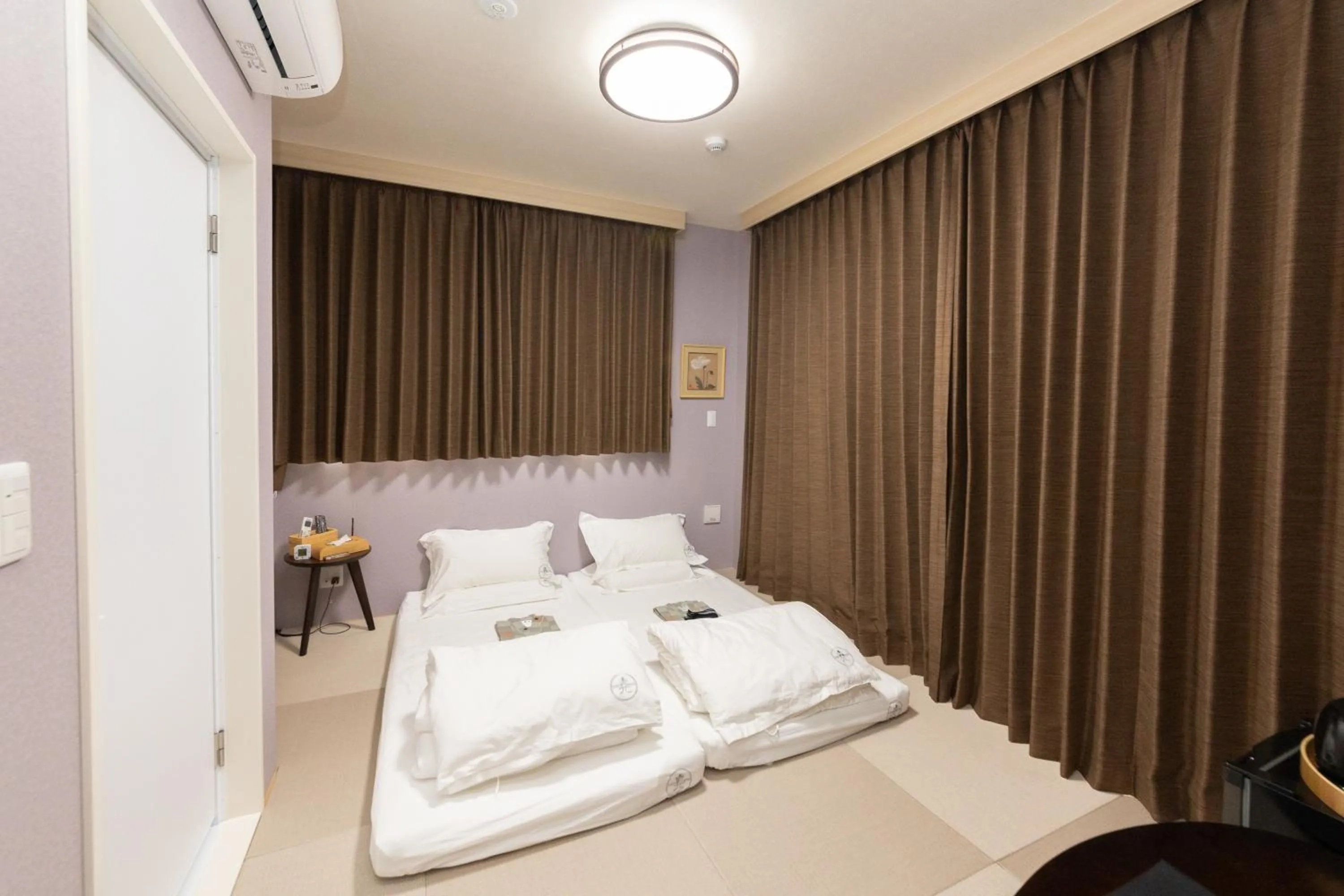 Bed in 灯光旅館 Light hotel