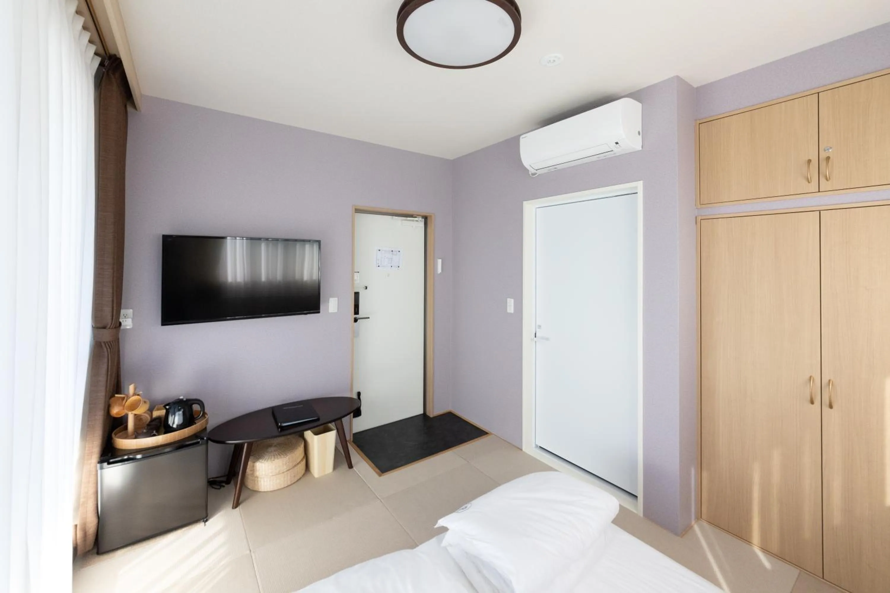 Bed in 灯光旅館 Light hotel