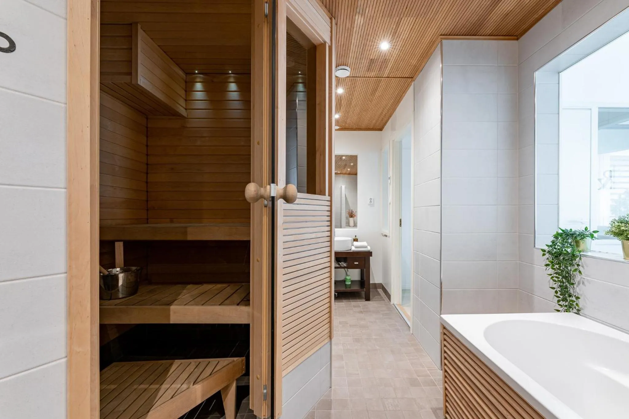 1BR Penthouse with Sauna & Rooftop Terrace