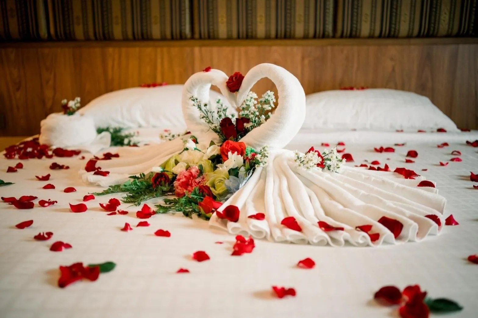 Bed in Le Erawan Phang Nga Hotel