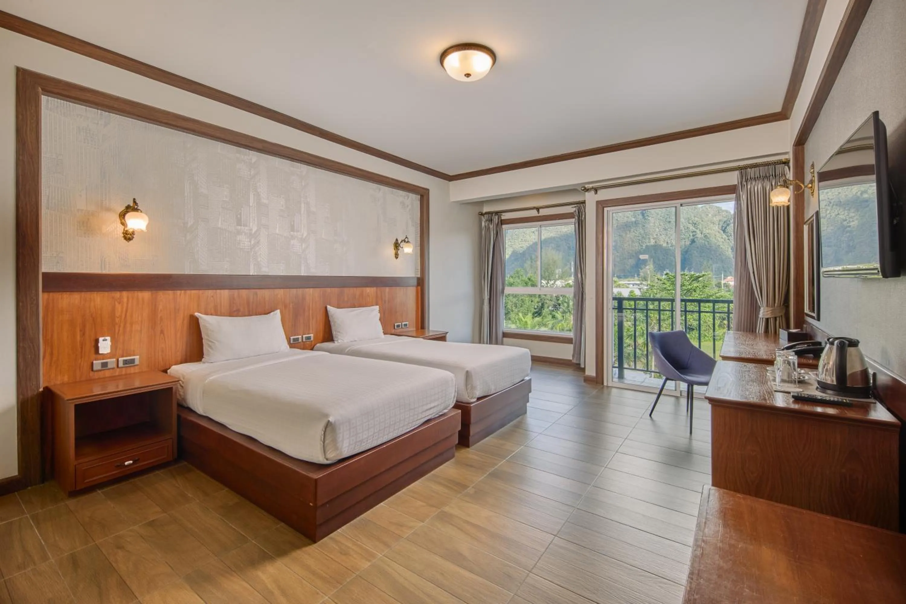 Photo of the whole room, Bed in Le Erawan Phang Nga Hotel