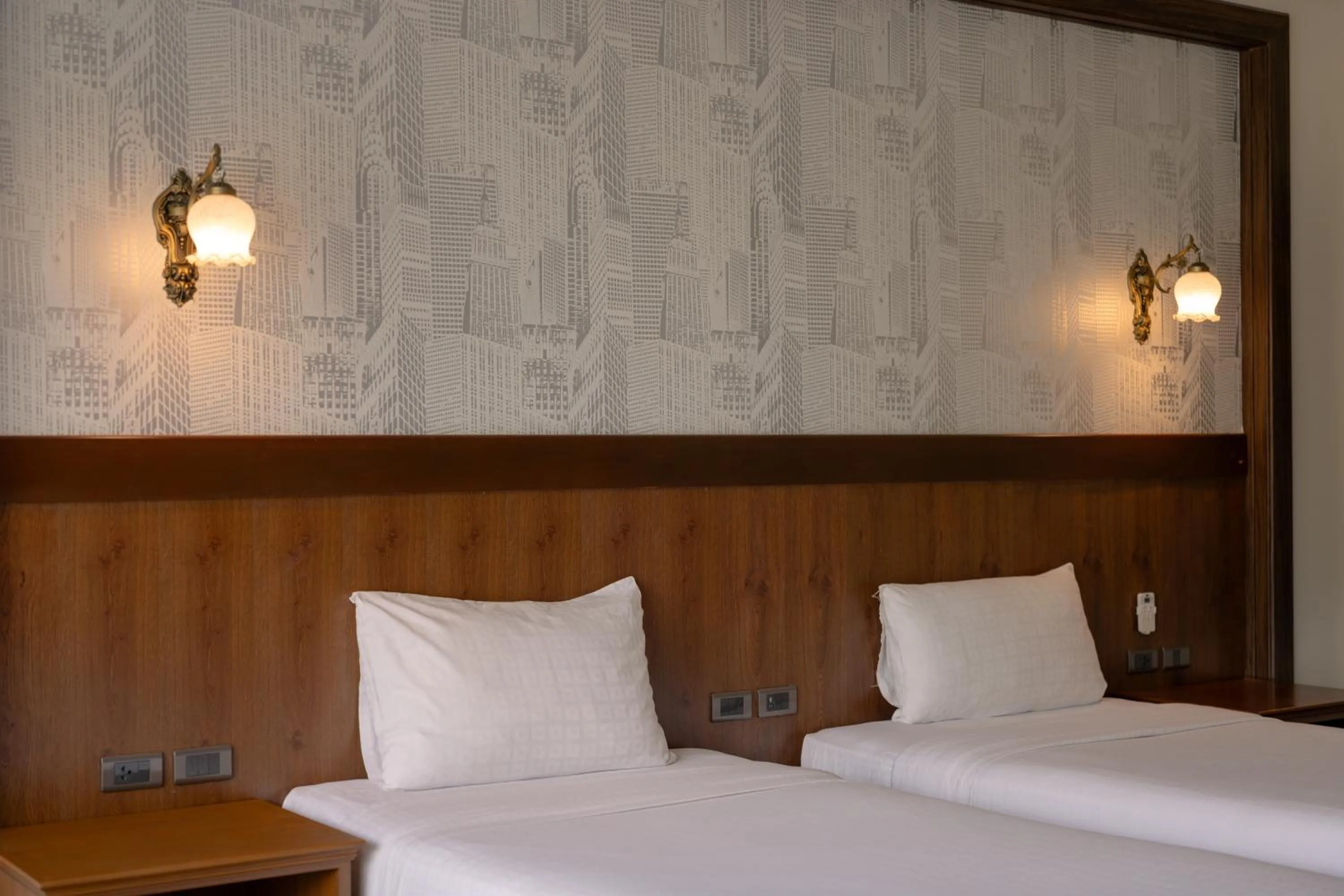 Bed in Le Erawan Phang Nga Hotel