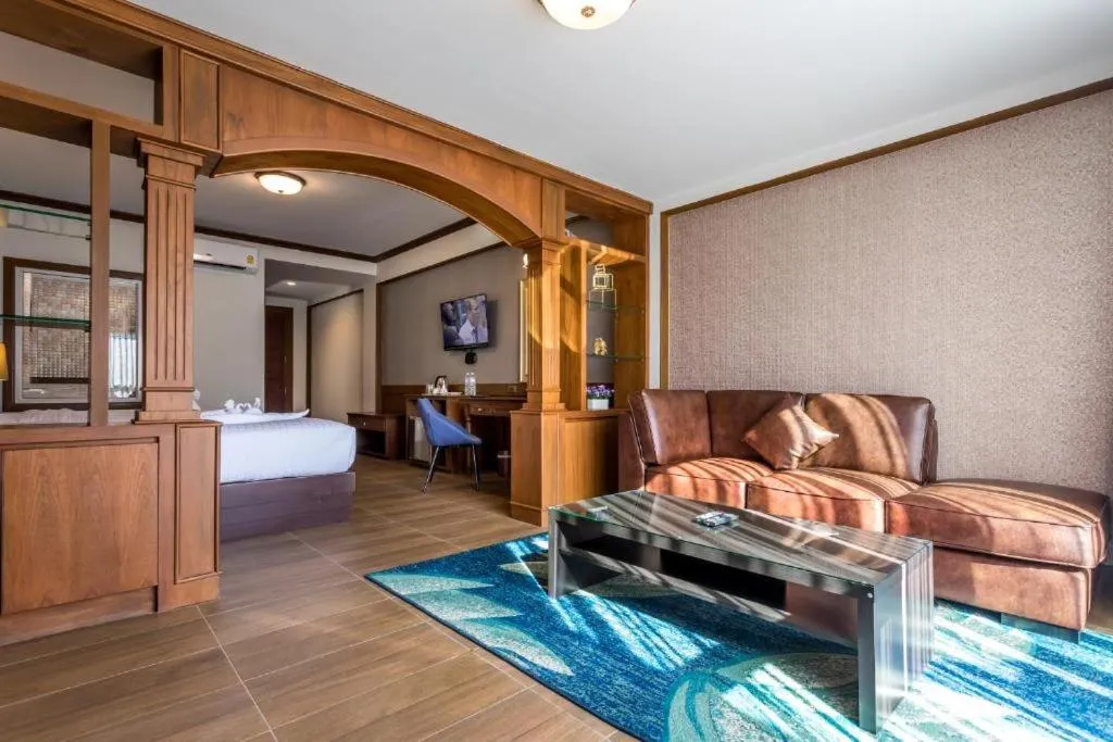 Bed in Le Erawan Phang Nga Hotel