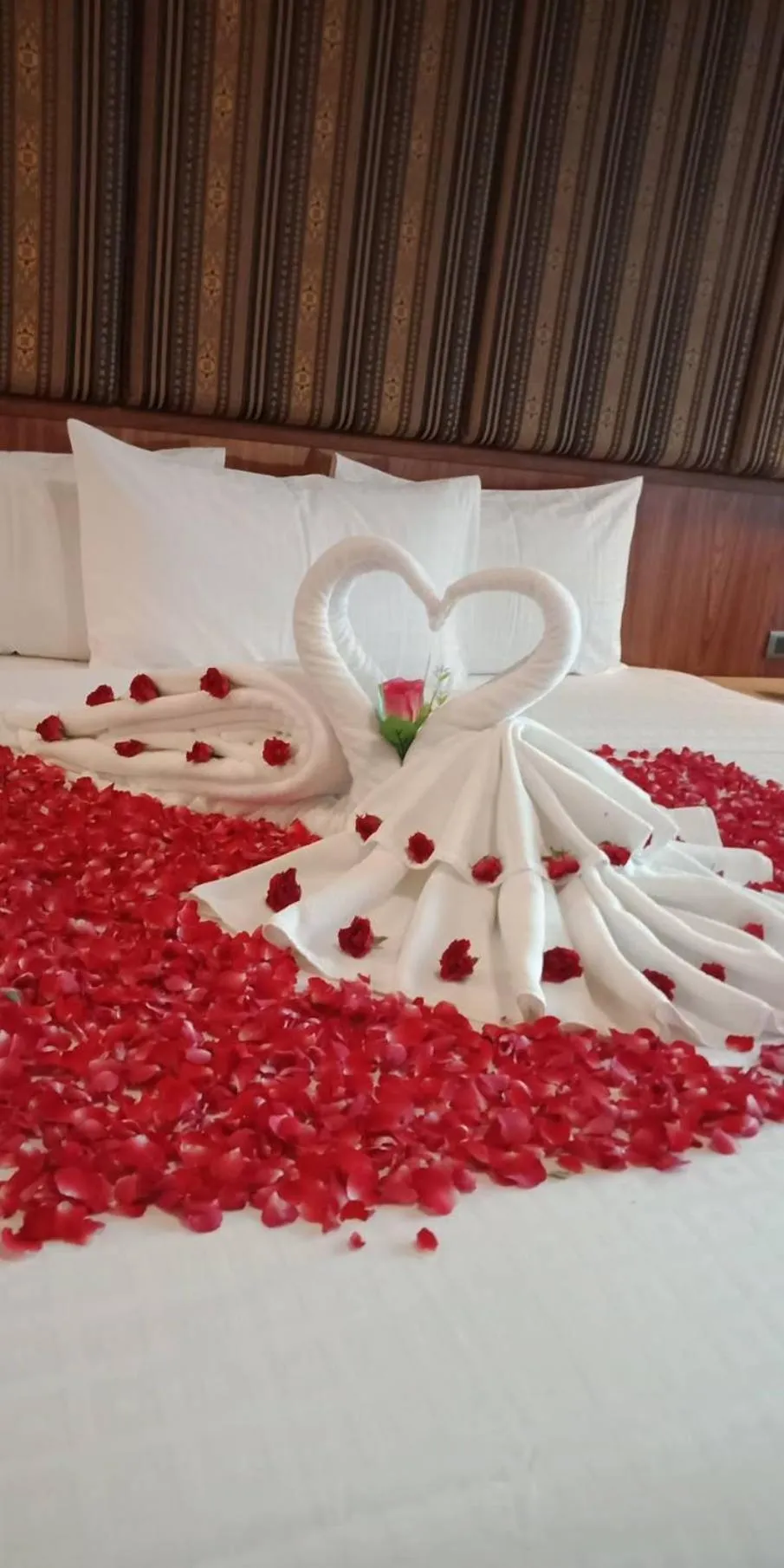 Bed in Le Erawan Phang Nga Hotel